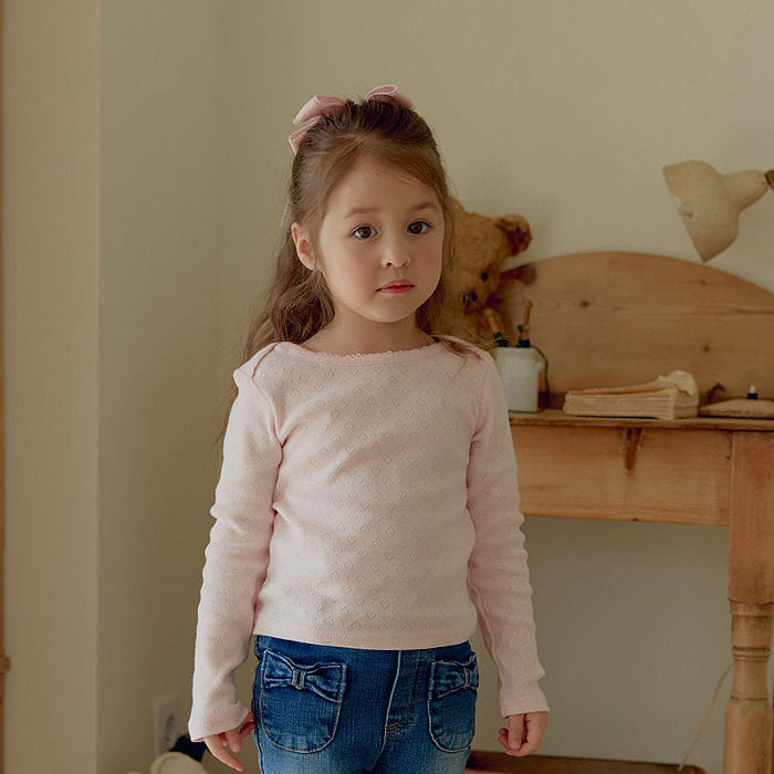 正韓春ueo 兩色愛心壓紋上衣