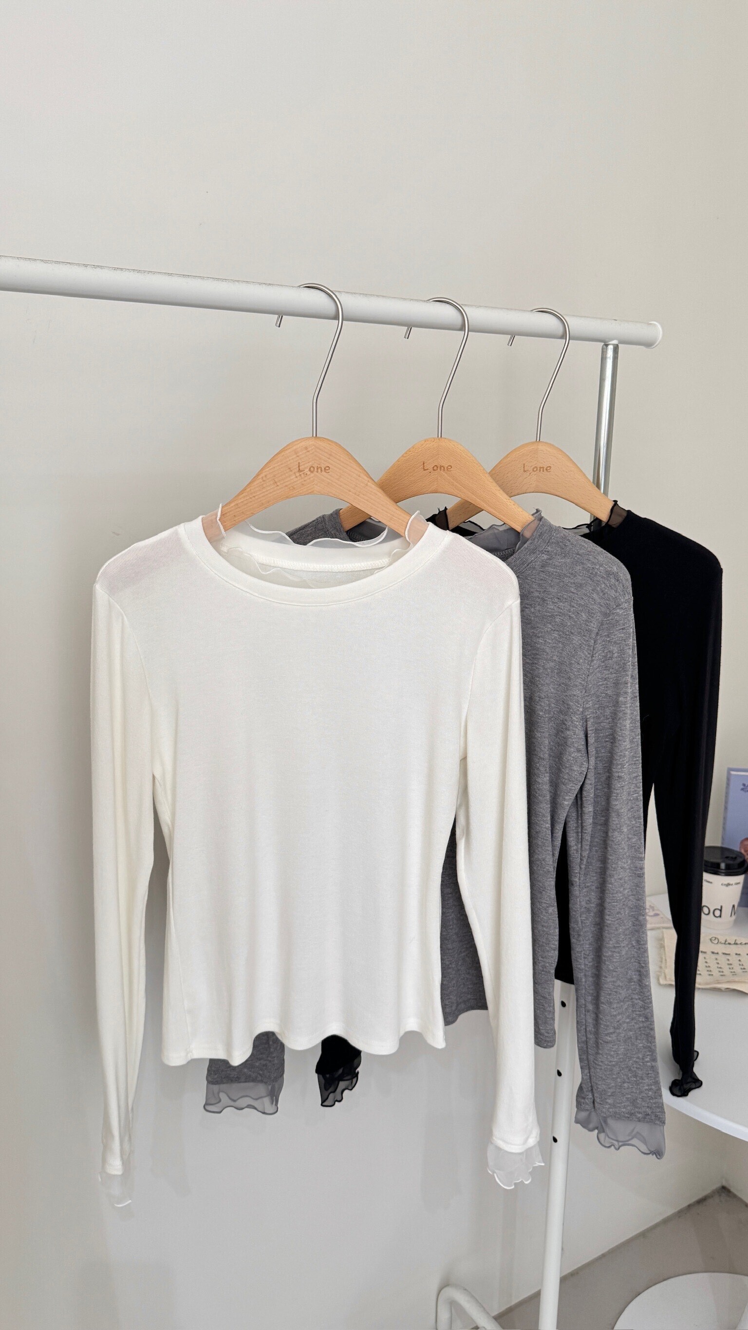 透紗木耳邊上衣