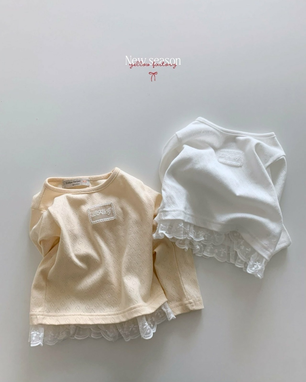 正韓春yellowfactory 愛心壓紋蕾絲拼接上衣
