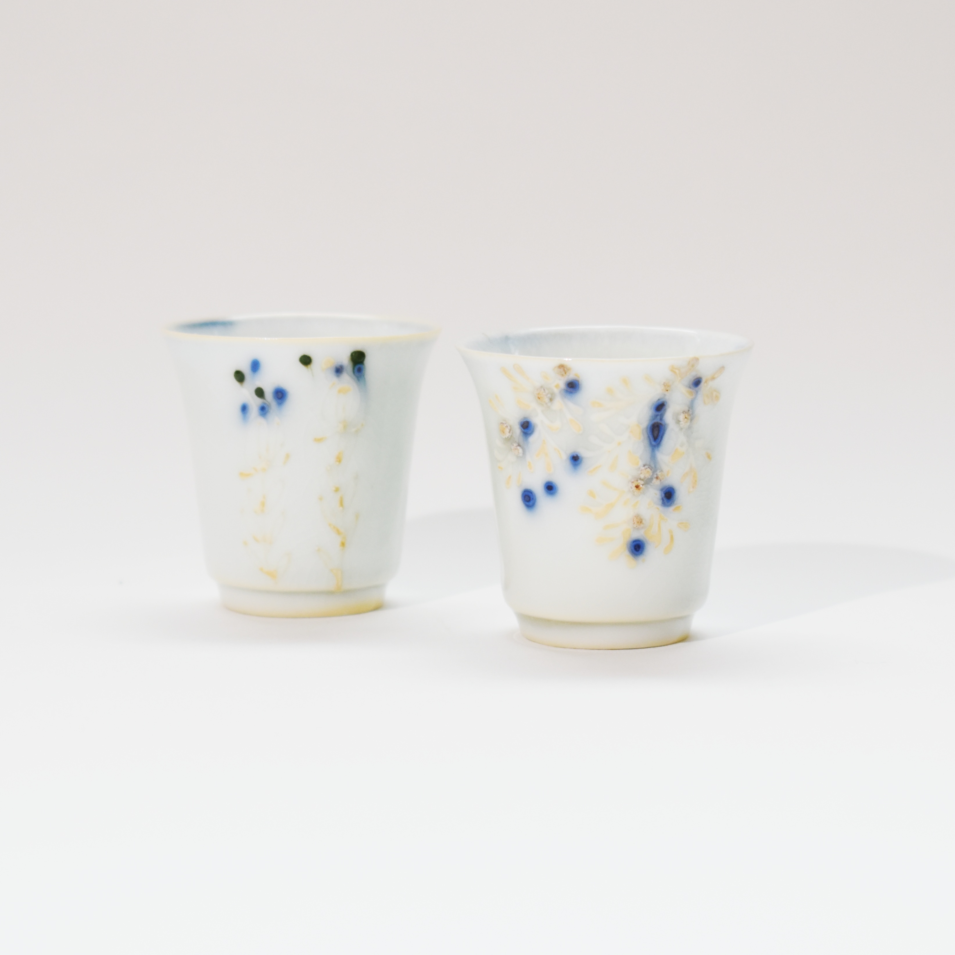 陶藝家 欒波 窯火共生 · 手繪薄胎白瓷對杯