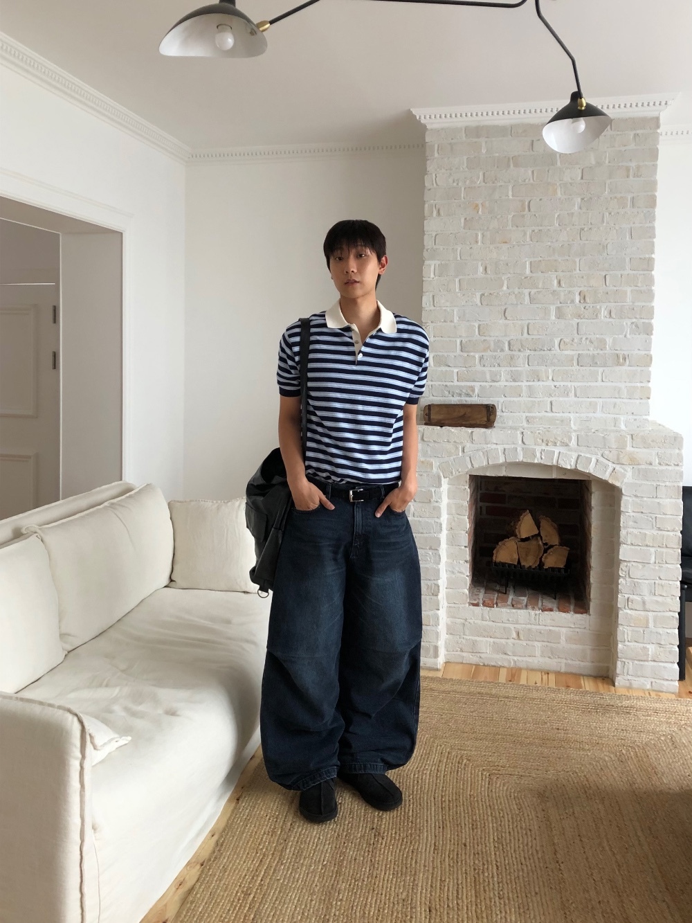 水洗彎刀牛仔褲