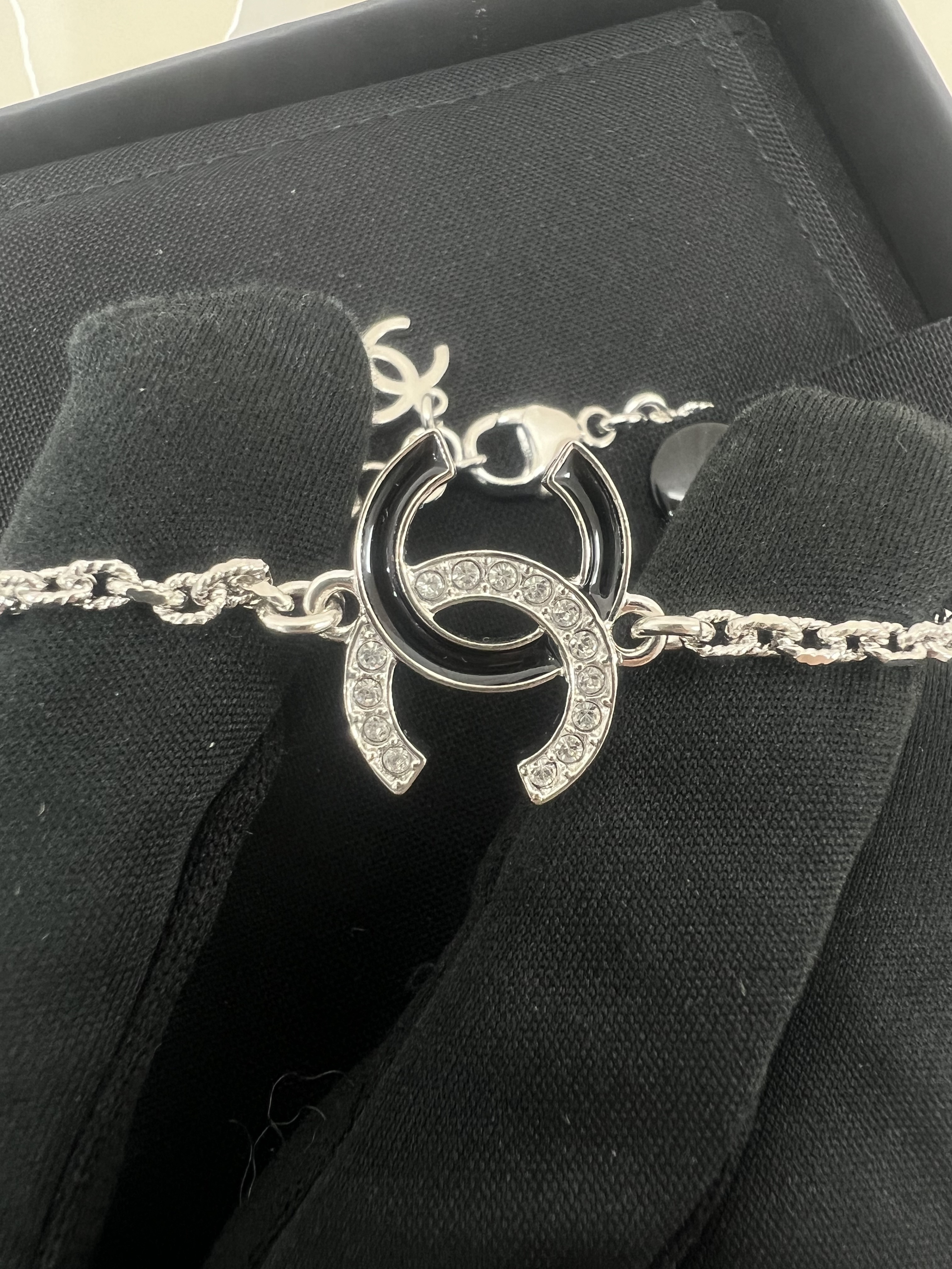 *Unused* Chanel 25s cc crystal/ black silver bracelet