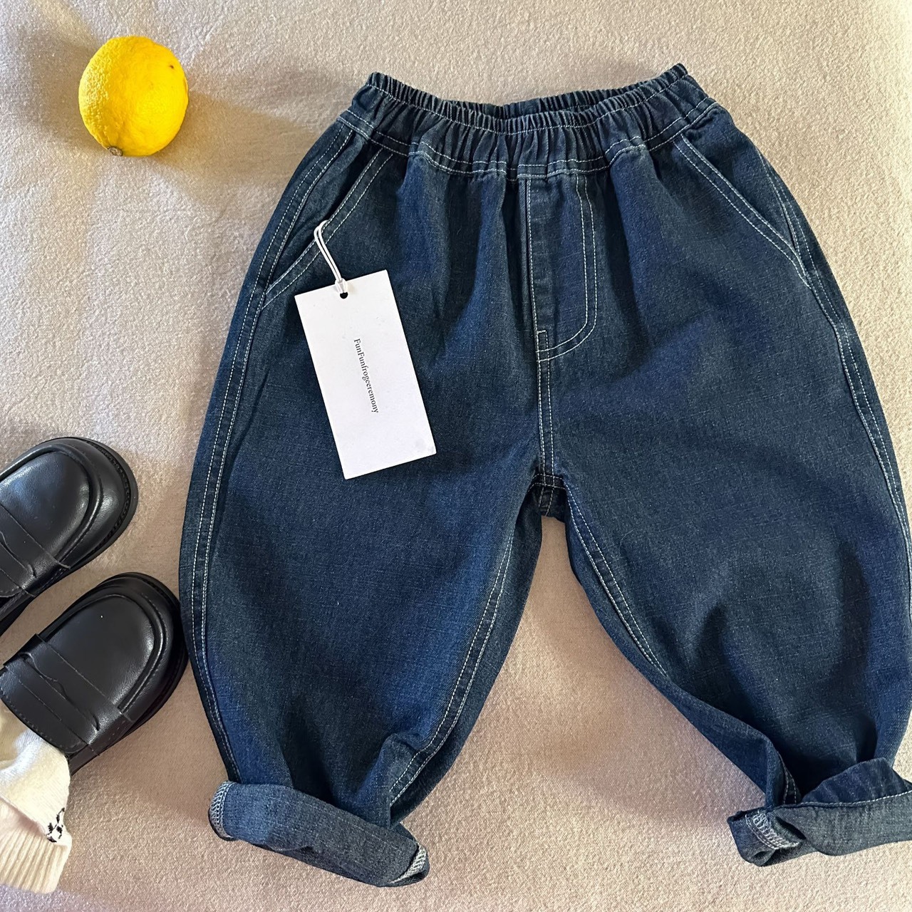 假口袋字母牛仔褲