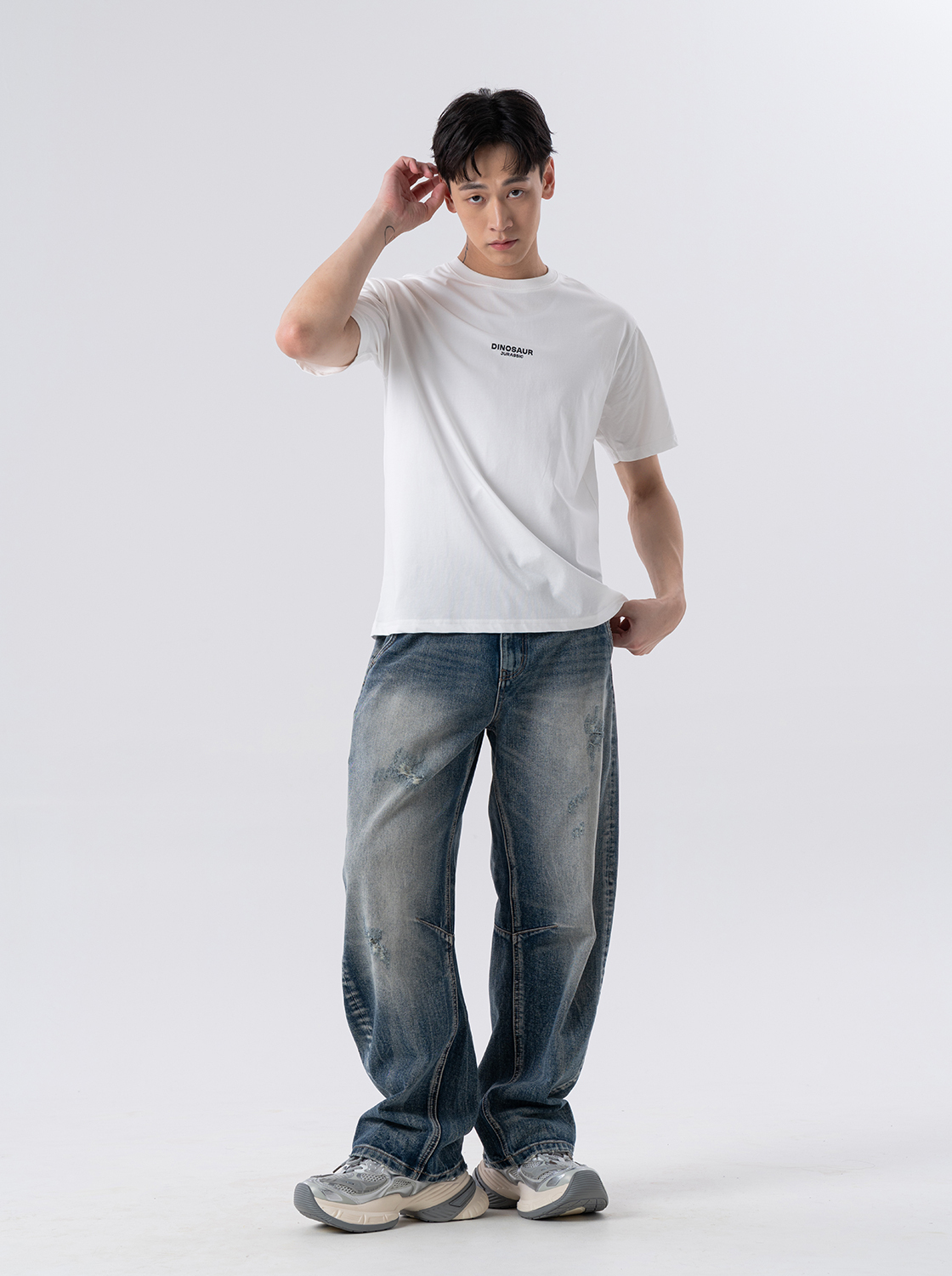 精緻水洗彎刀牛仔褲