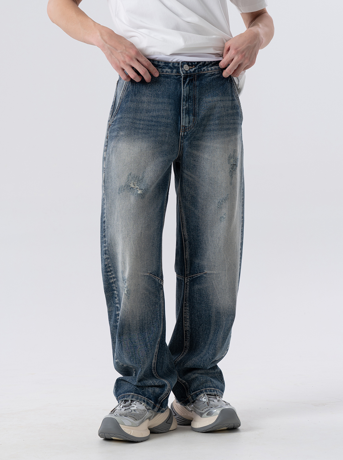 精緻水洗彎刀牛仔褲