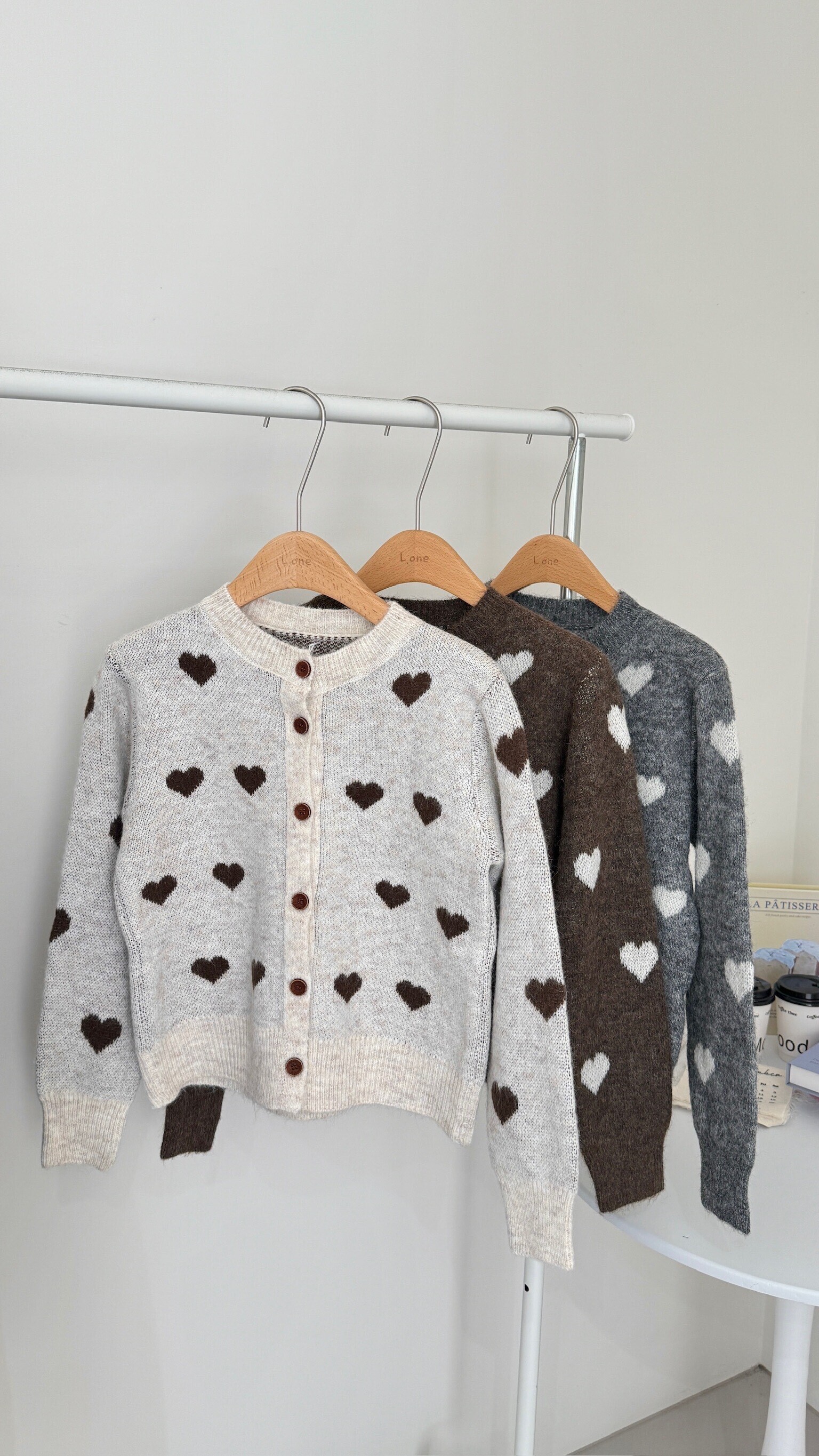 愛心排釦針織上衣