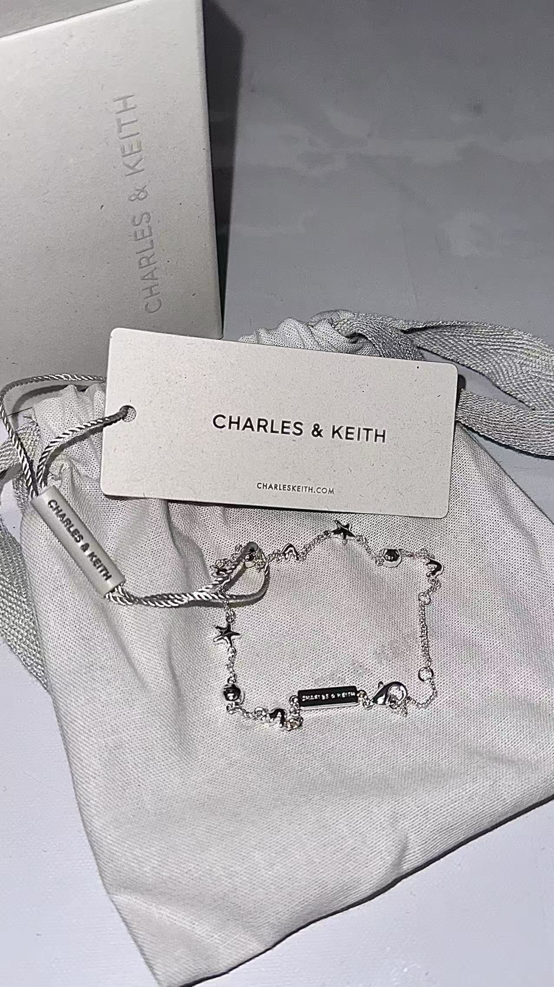 代購-CHARLES&KEITH 小ck 夏日度假風 情人節限定 貝殼海星 黃銅 手鍊 Silver銀色