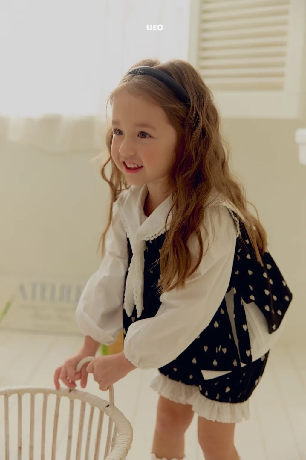 UEO 愛心側蝴蝶結背心 / 2色