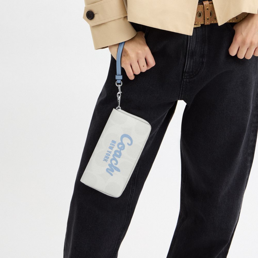 【Coach Outlet】Long Zip Around Wallet In Signature Canvas  白