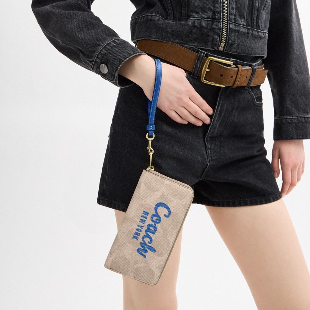 【Coach Outlet】Long Zip Around Wallet In Signature Canvas With Coach Graphic  奶茶