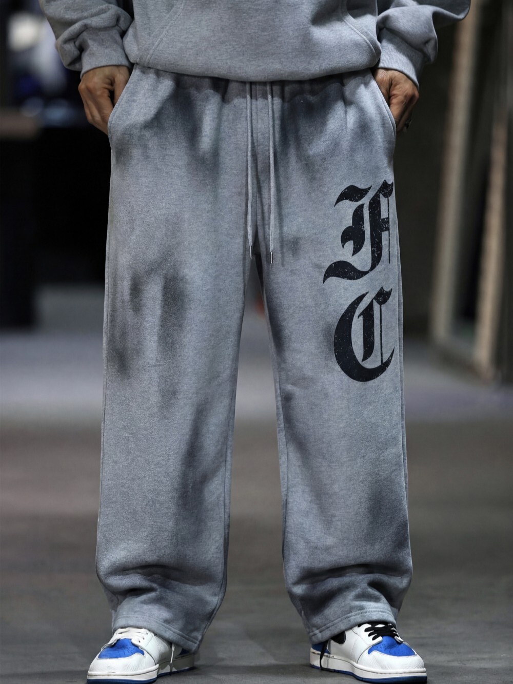 髒污水洗字母休閒棉褲