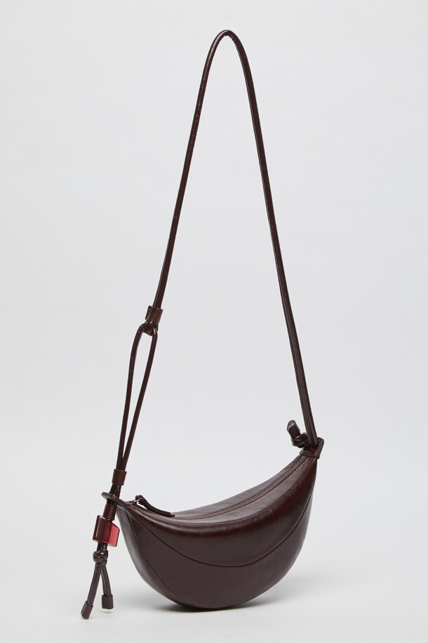 Archivépke Small Fling Bag - GLOSSY CRACK BURGUNDY