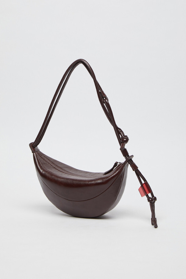 Archivépke Small Fling Bag - GLOSSY CRACK BURGUNDY