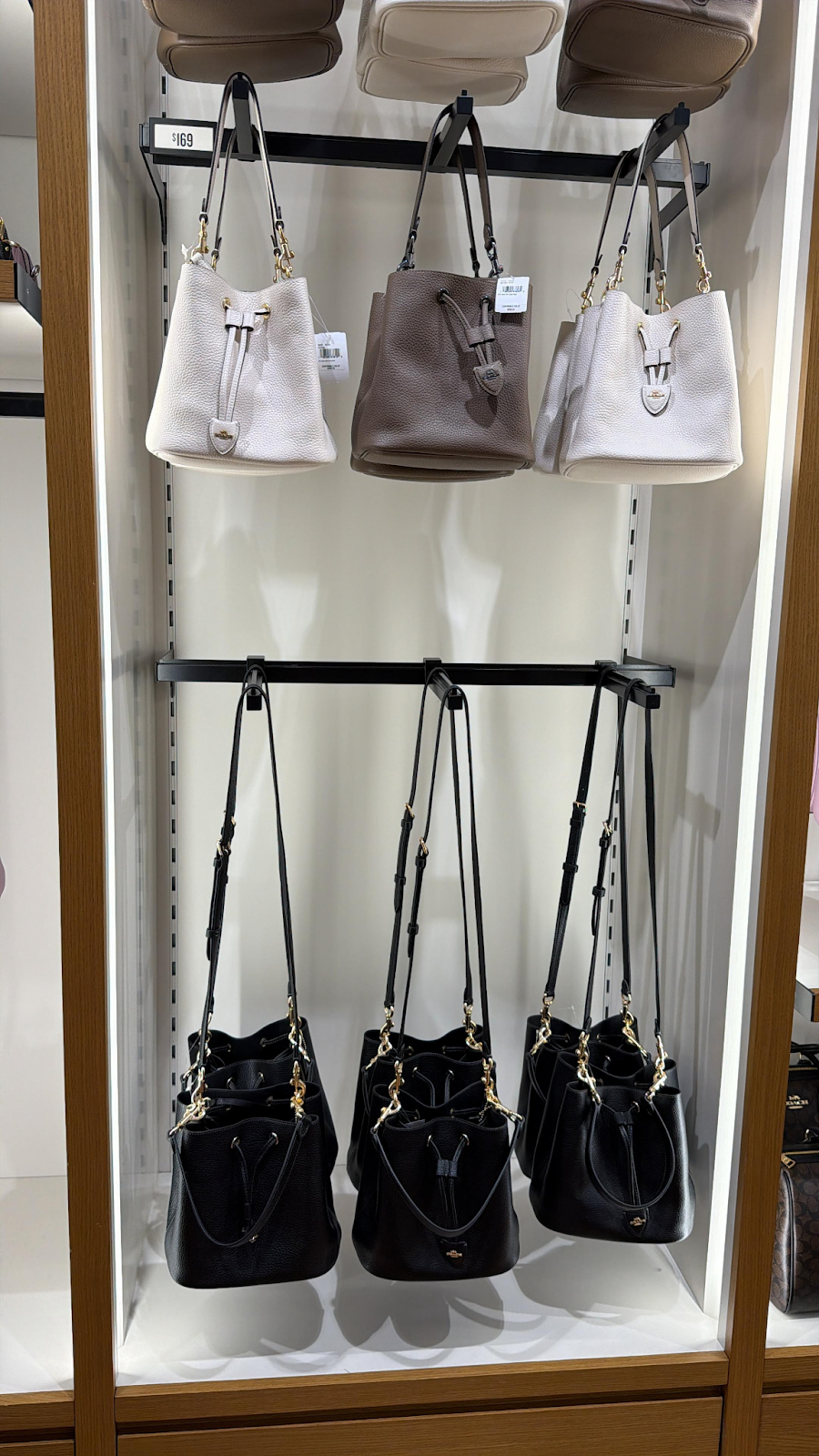 VR025 Coach 細LOGO淨色水桶包 22x21CM