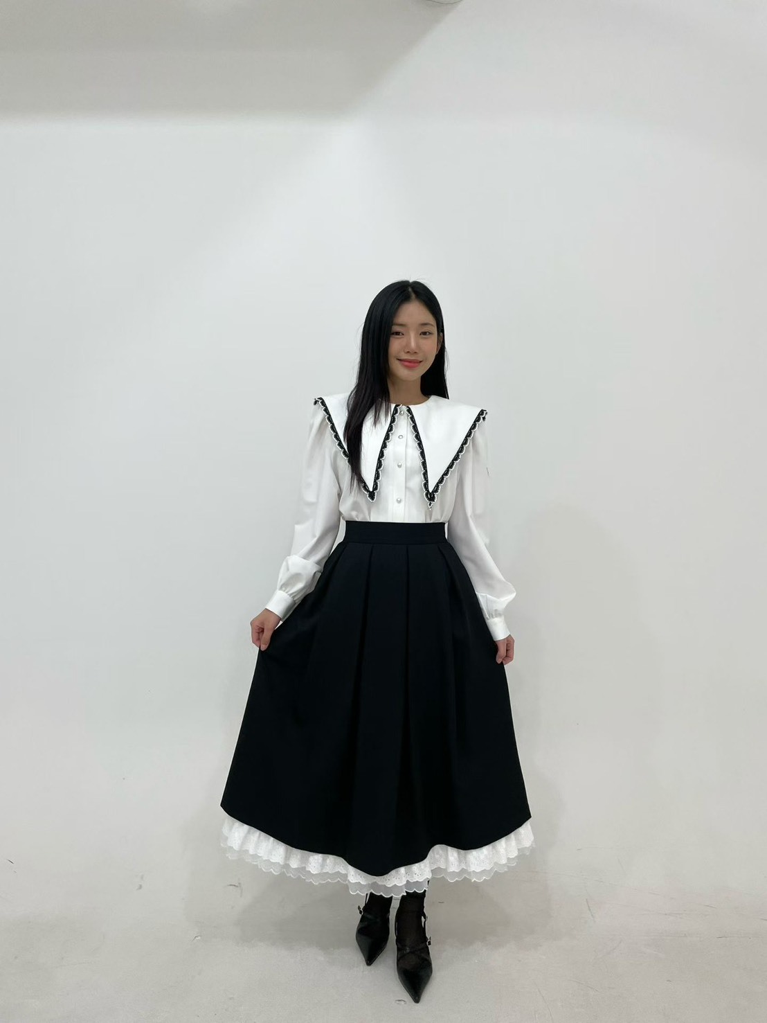 黑色白荷葉邊圓長裙