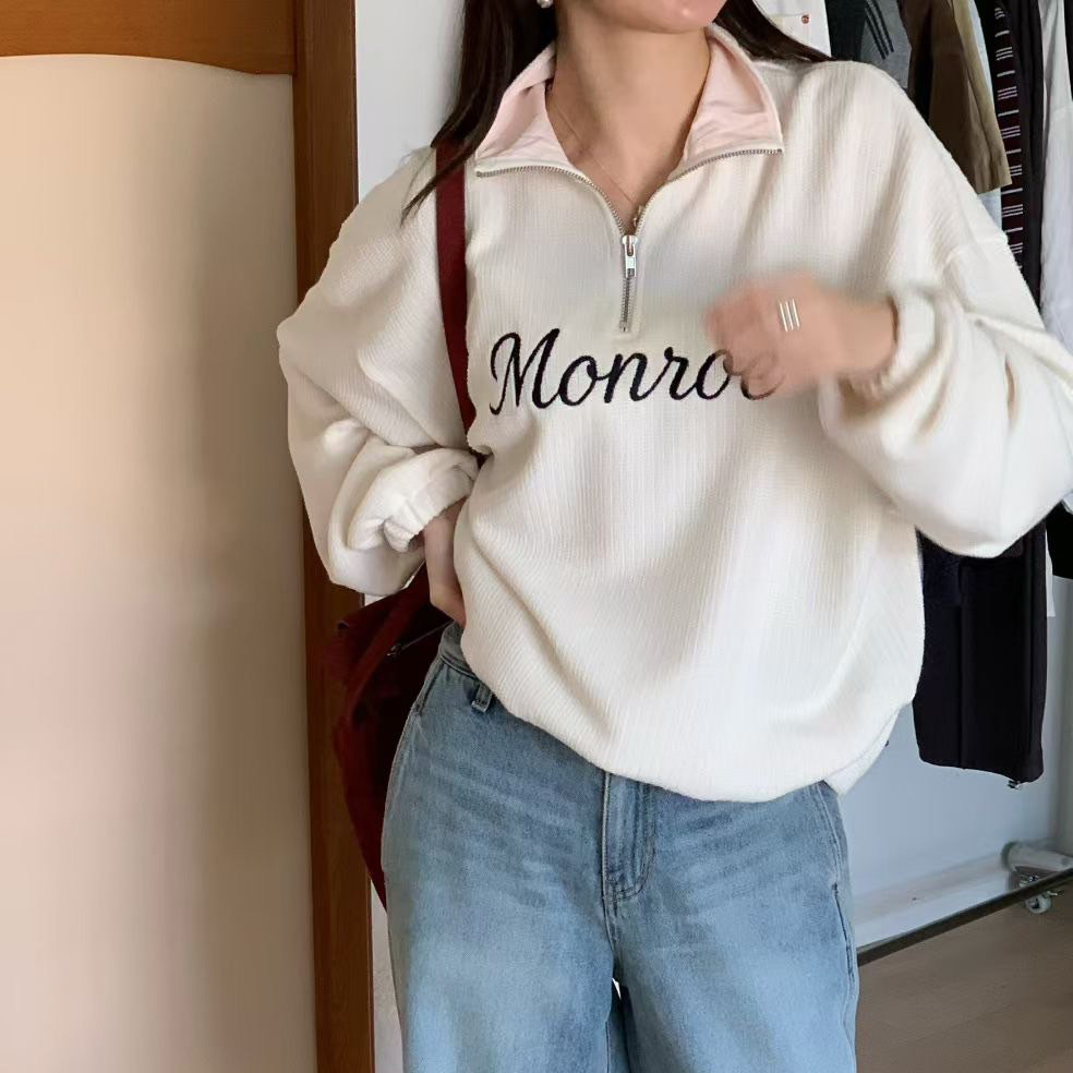 粉紅色拉鍊翻領造型配色刺繡衛衣