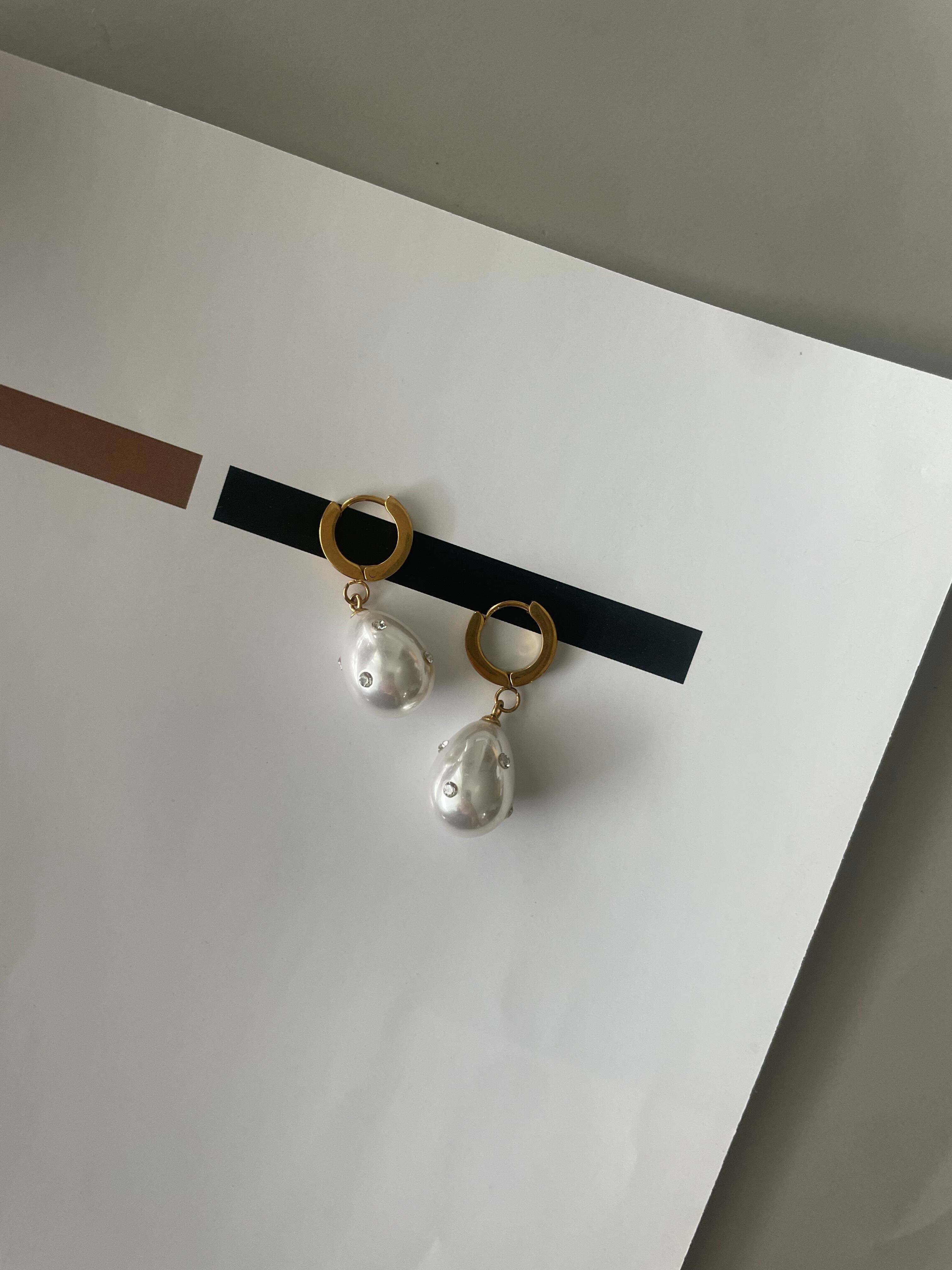 milky teardrop pierce