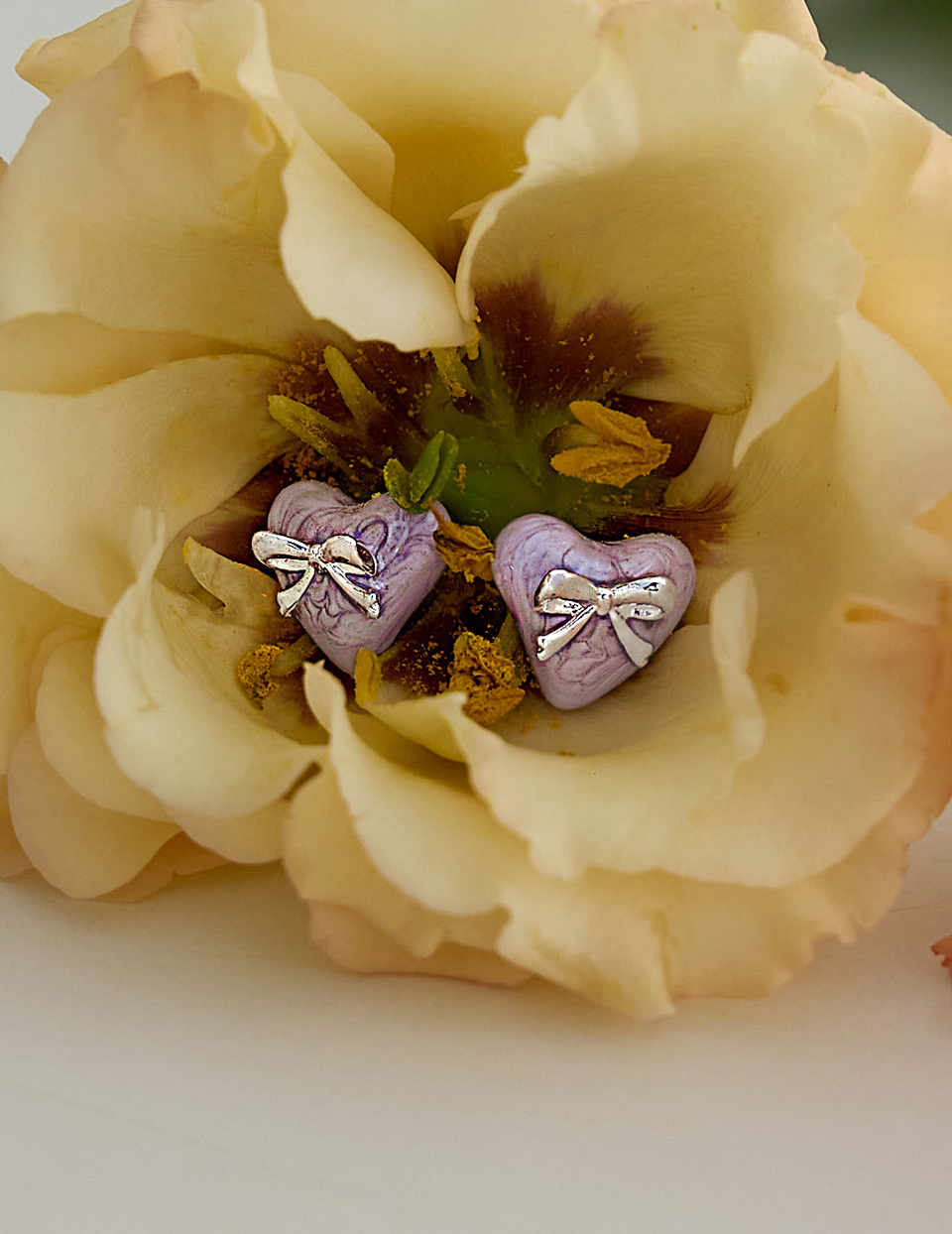 芋泥滴釉愛心蝴蝶結。針式耳環