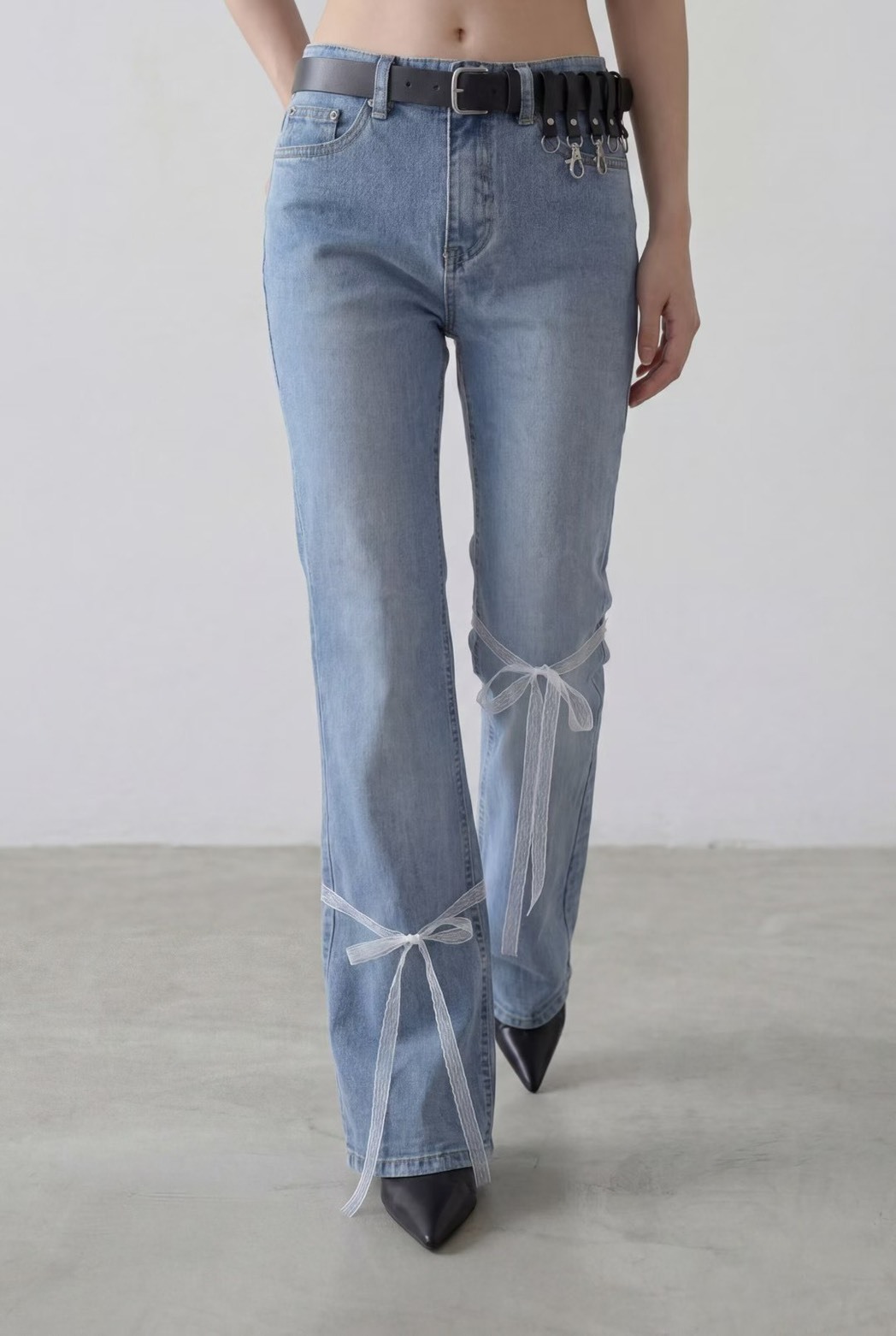 蕾絲綁結牛仔長褲