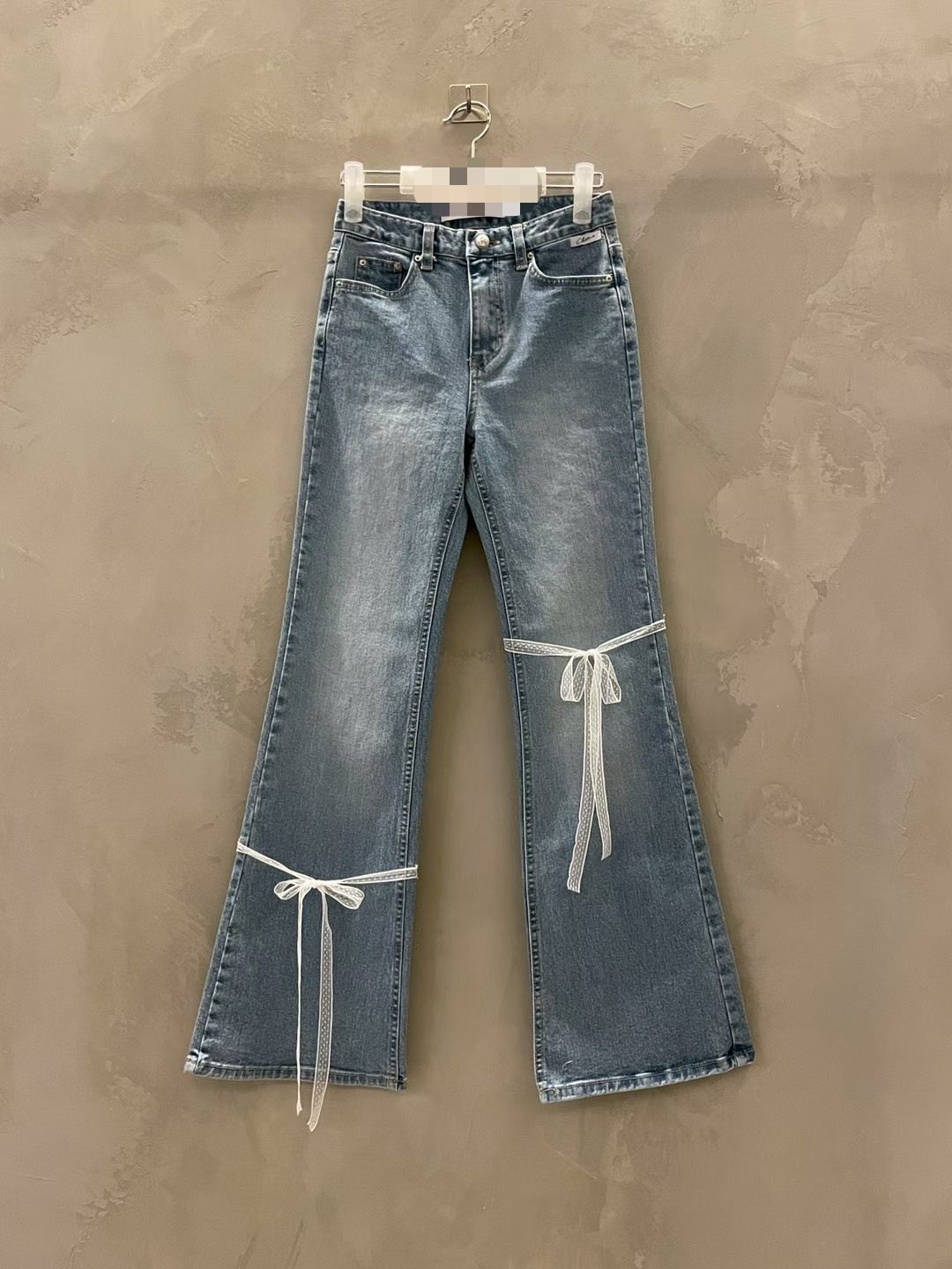 蕾絲綁結牛仔長褲