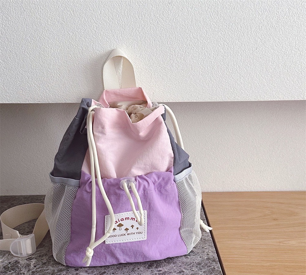 簡約拚色束口後背包