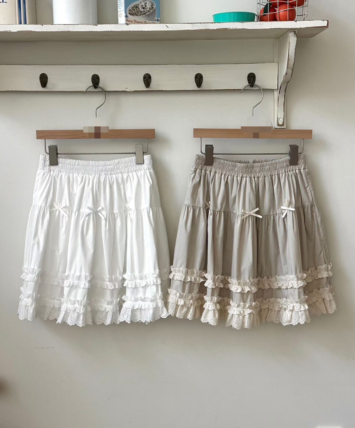 奶油蕾絲小緞帶結短裙