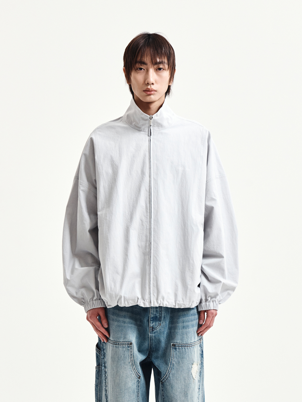 BACK LOGO HIGH NECK JUMPER IN LIGHT GREY