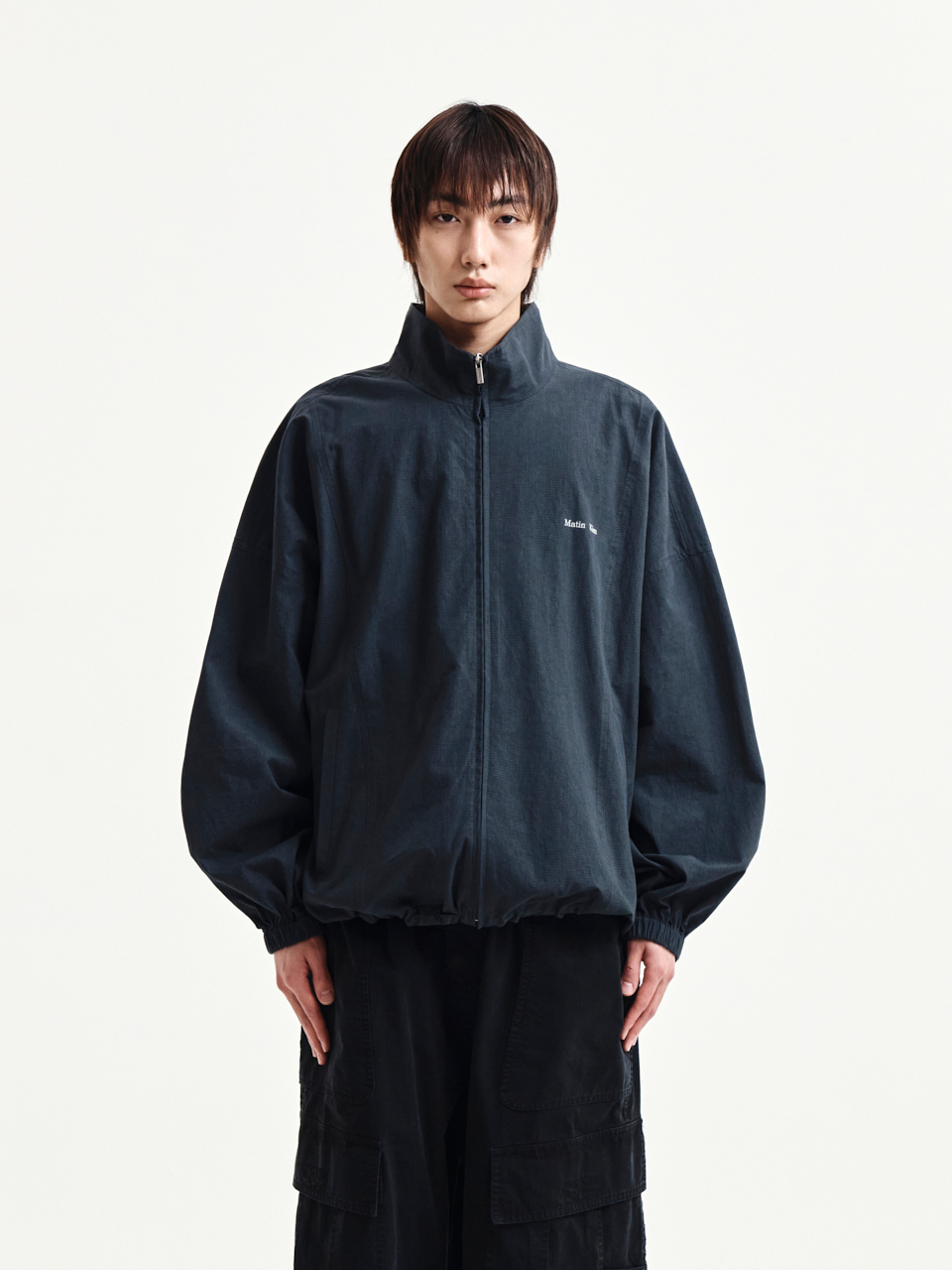 BACK LOGO HIGH NECK JUMPER IN CHARCOAL