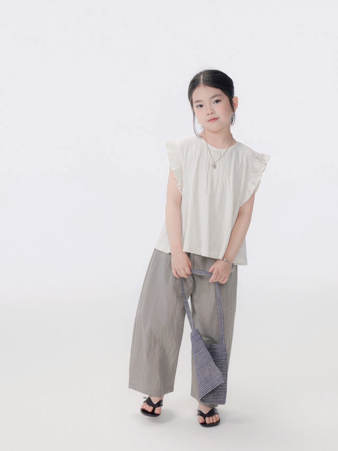 荷葉邊坑條上衣