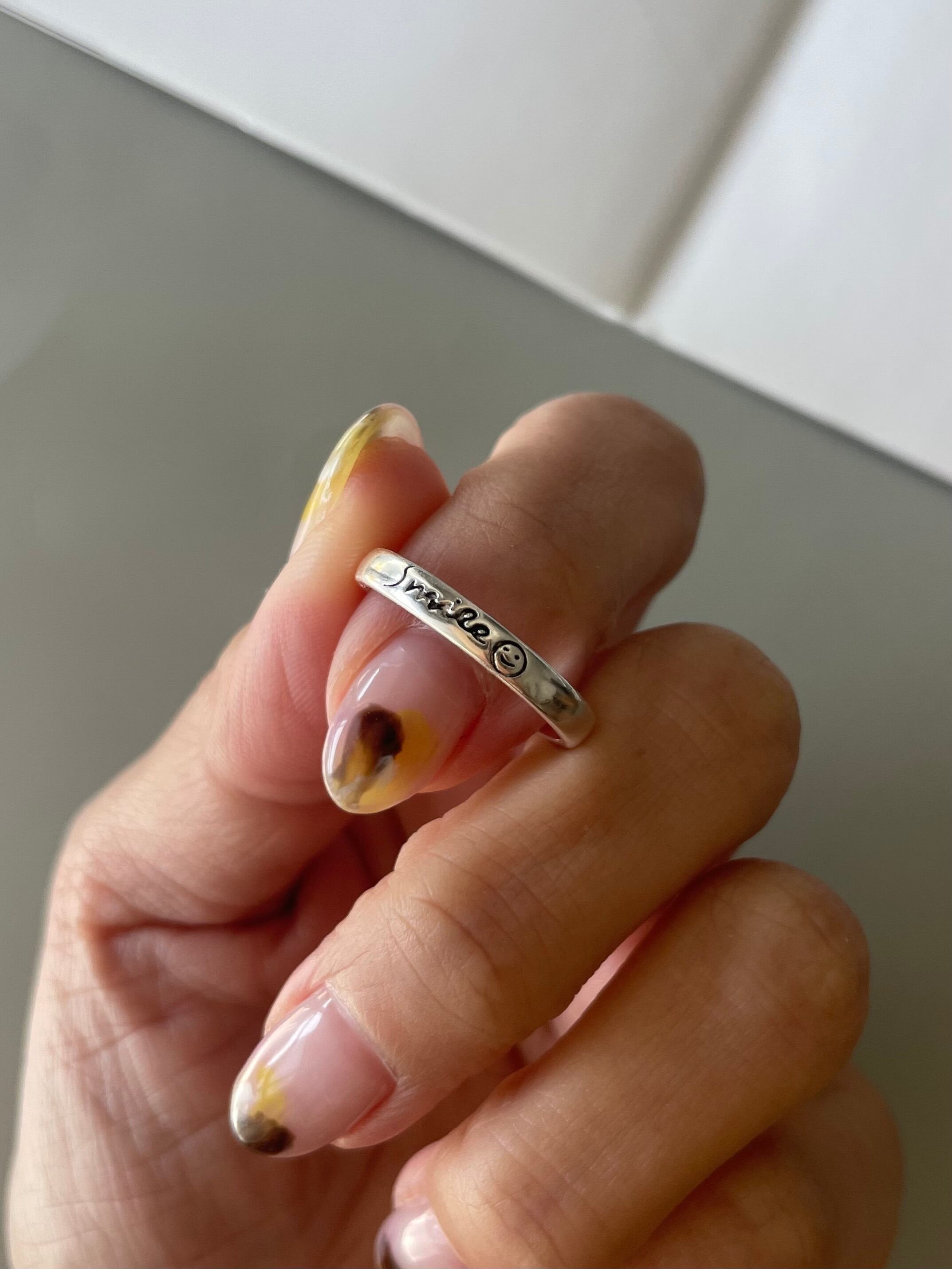 smile letter ring