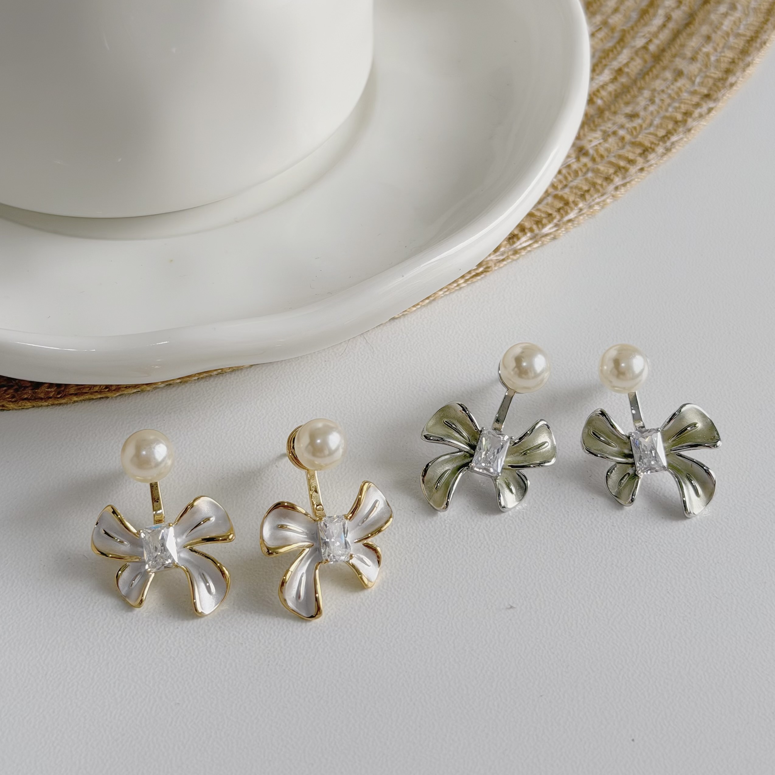 A274珍珠烤漆蝴蝶結前後扣