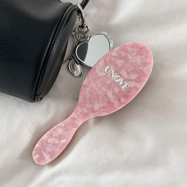 UNOVE 專業氣墊按摩大板梳