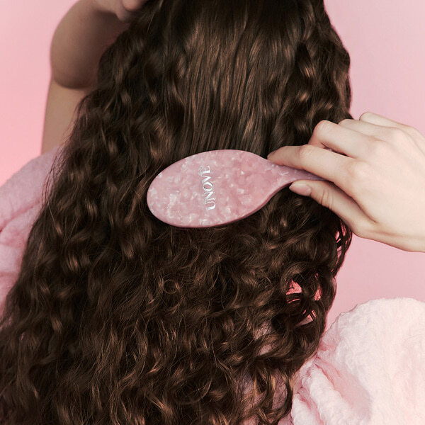 UNOVE 專業氣墊按摩大板梳