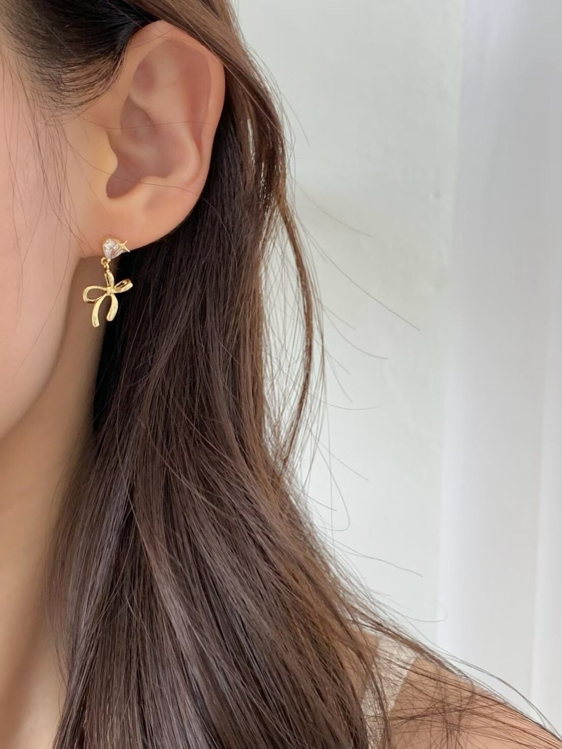 質感金單鑽接蝴蝶結垂墜耳環