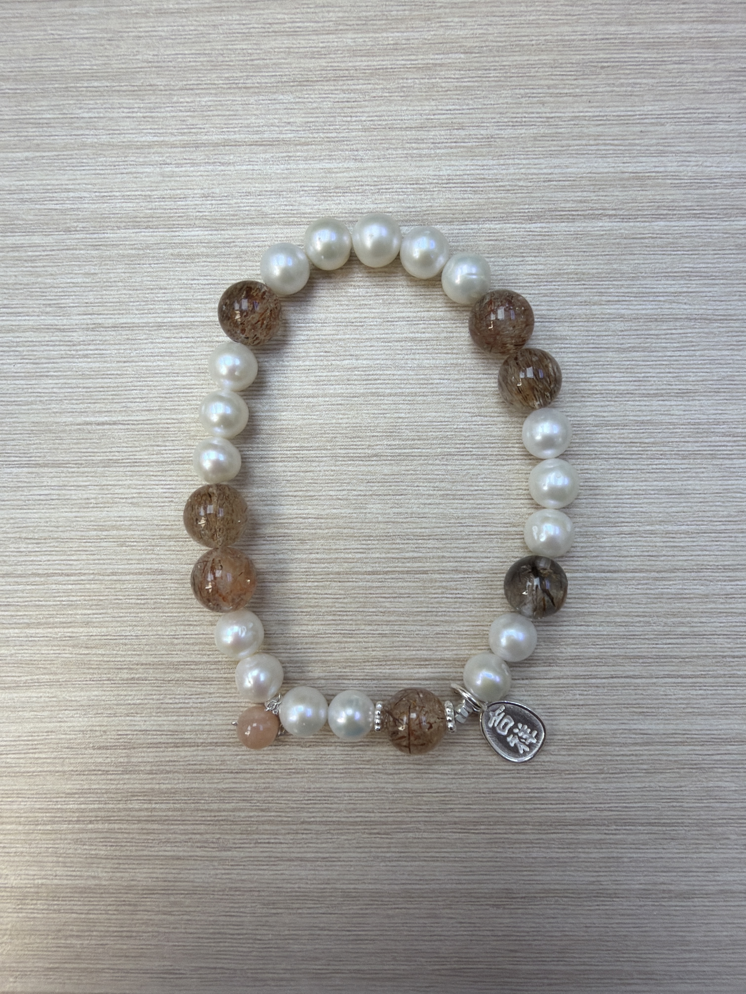 RK05 S925銀+淡水珍珠+黑金超+橙月光手串 (SPB0997001)