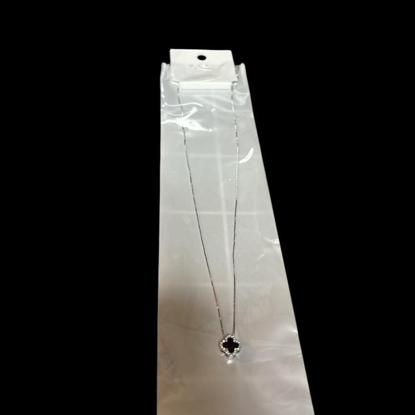 Delicate silver four-leaf clover necklace