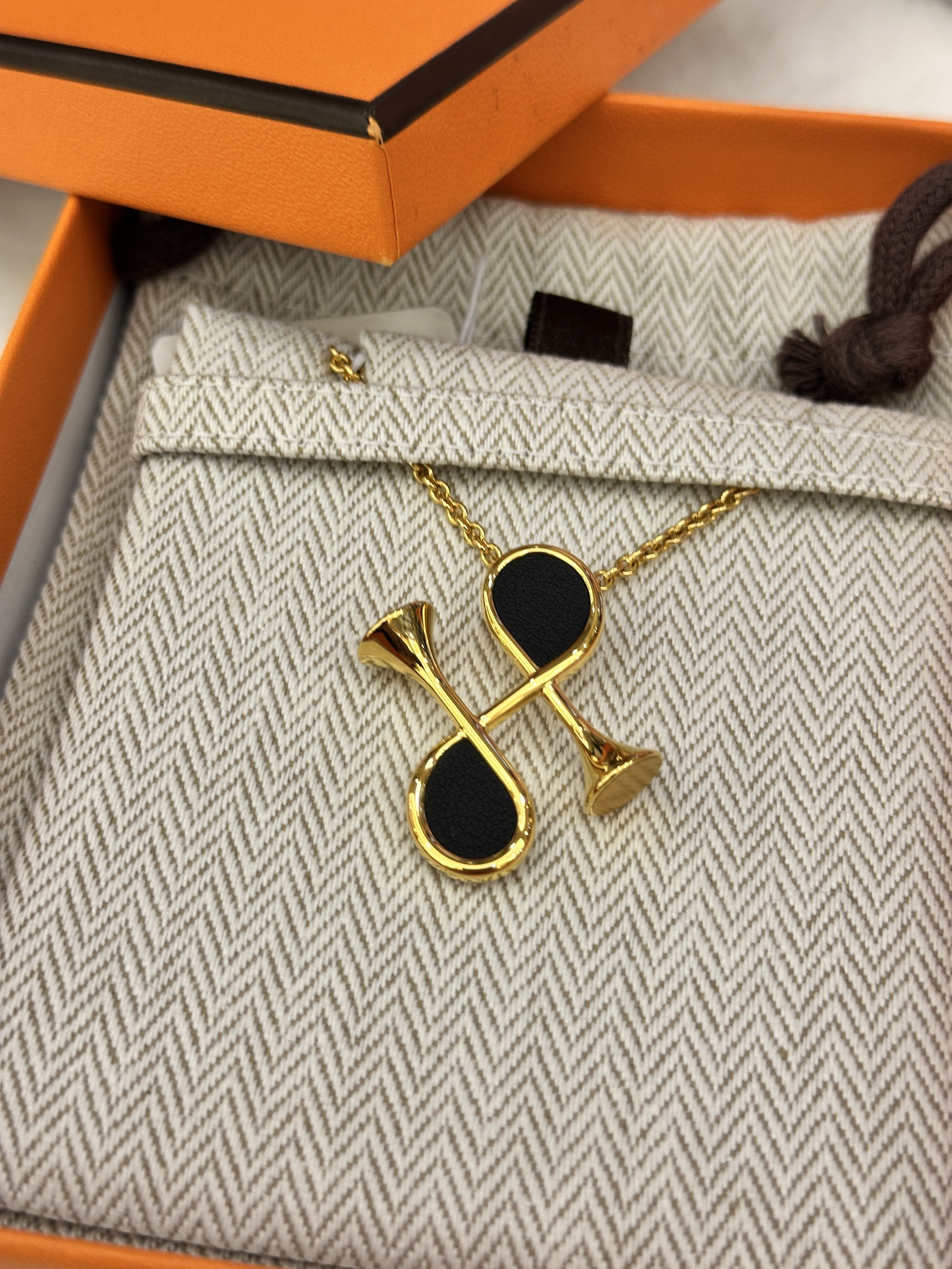 Hermes Cor H brooch