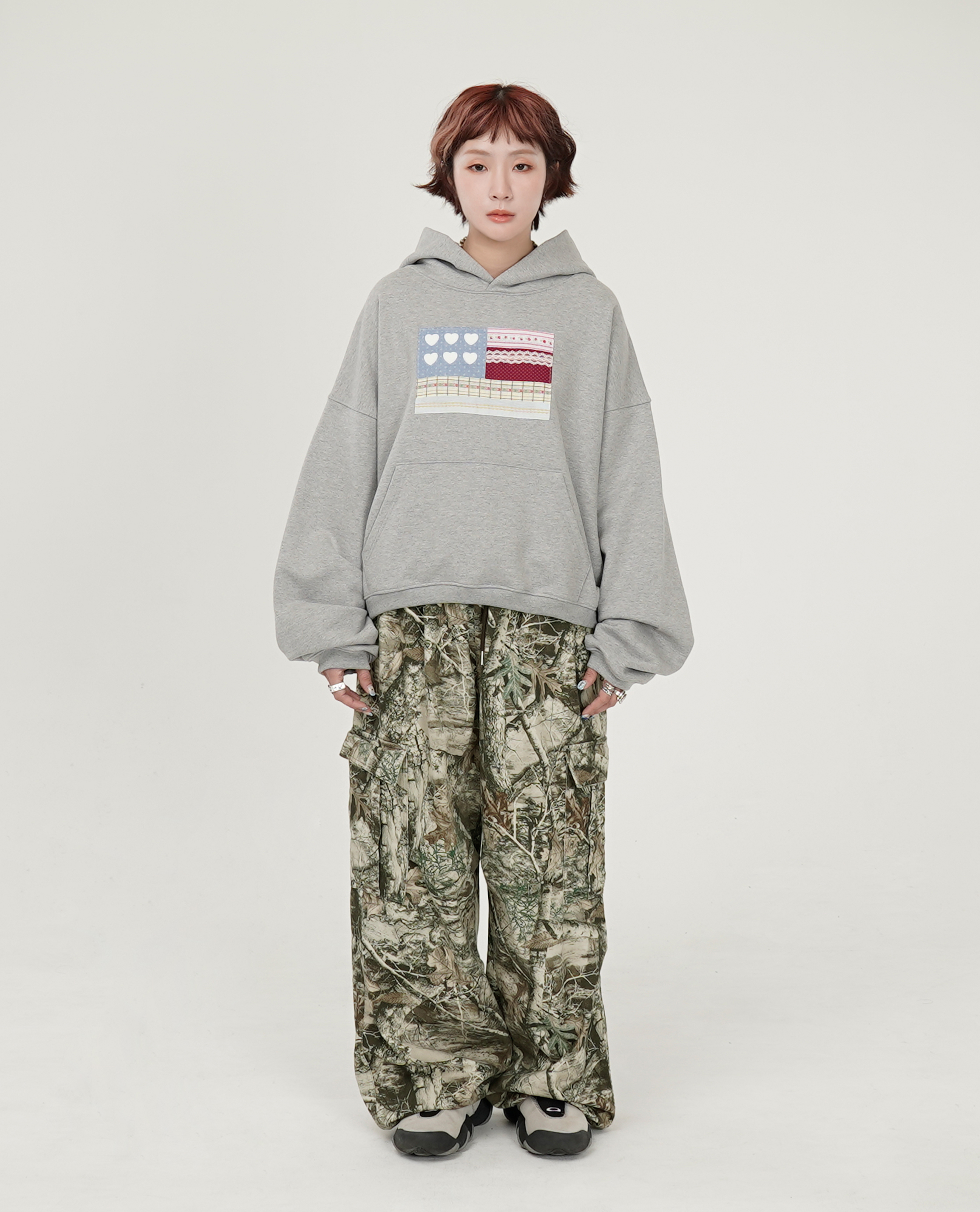 THE MUSEUM VISITOR PATCHWORK SIX HEART SWEAT HOODIE - 26SS