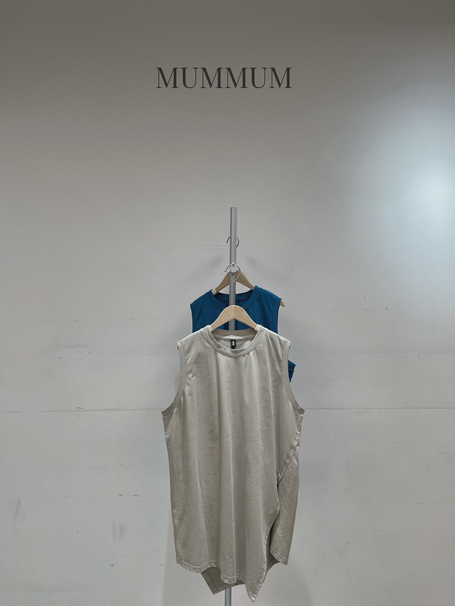 0213158a/慵懶風不規則開叉背心上衣 48/48/34