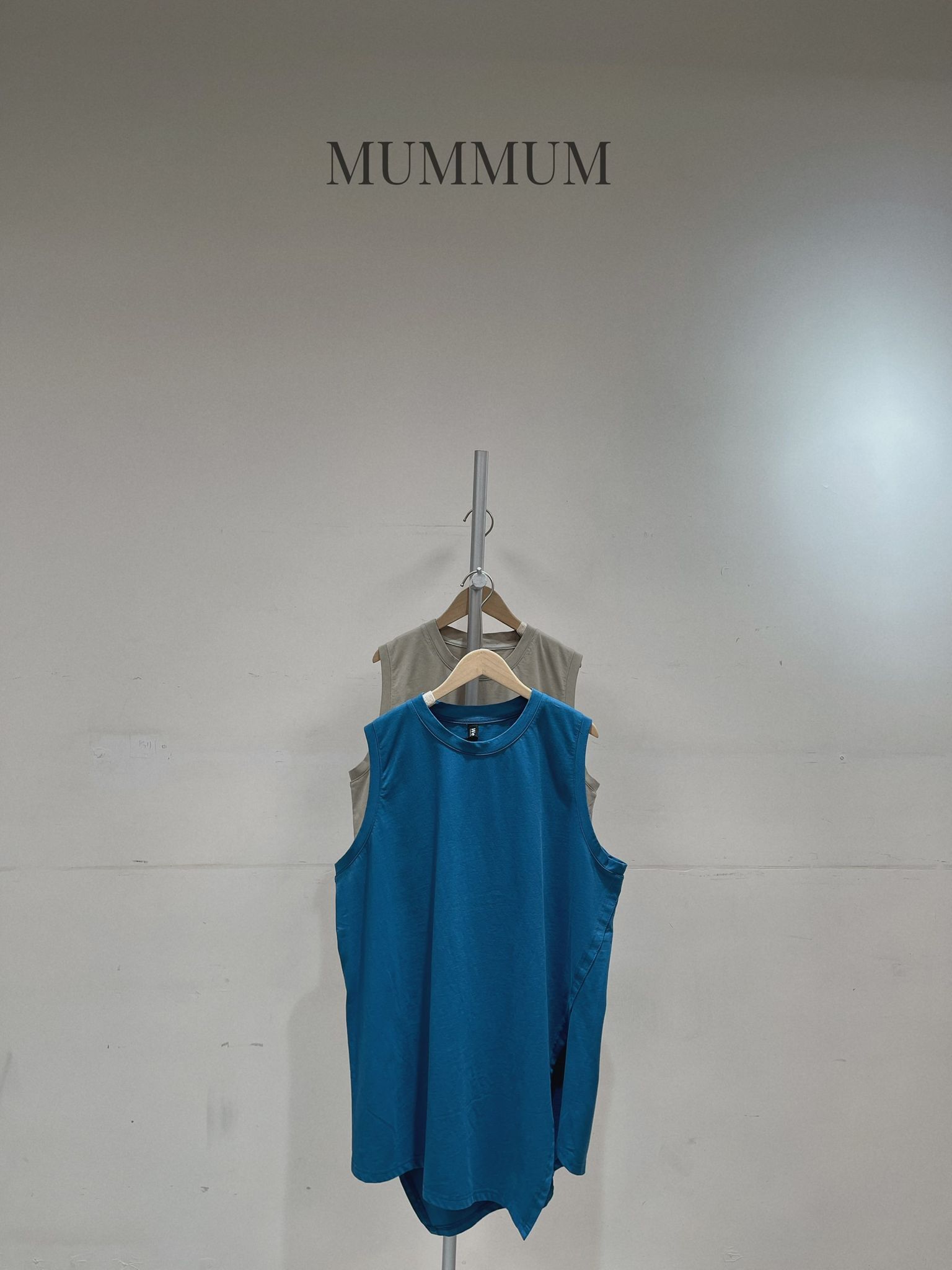 0213158a/慵懶風不規則開叉背心上衣 48/48/34