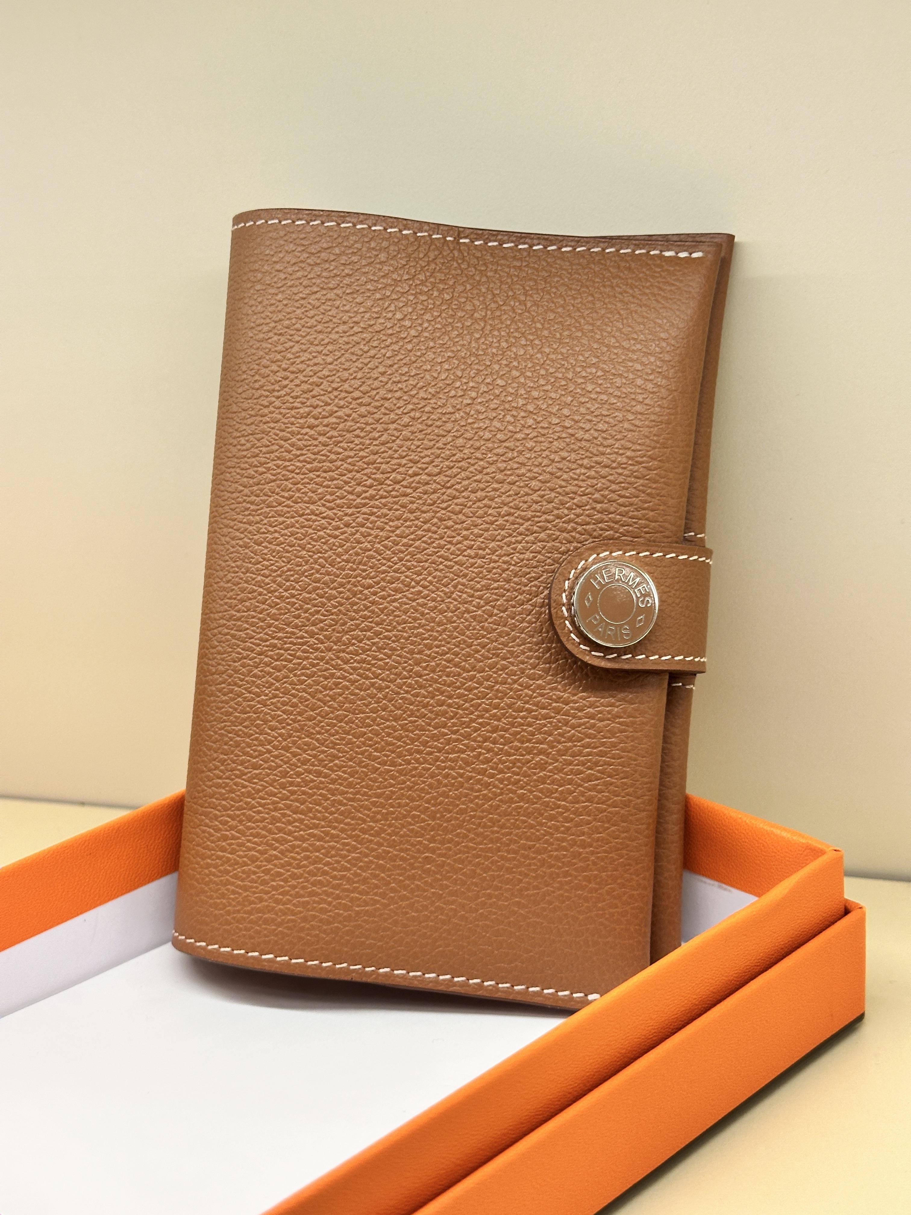 Hermes R.M.S passport case gold