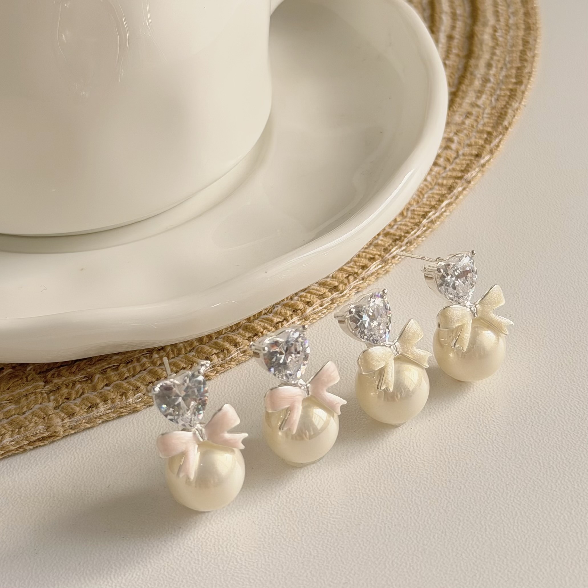 A284鋯石愛心蝴蝶結珍珠耳針