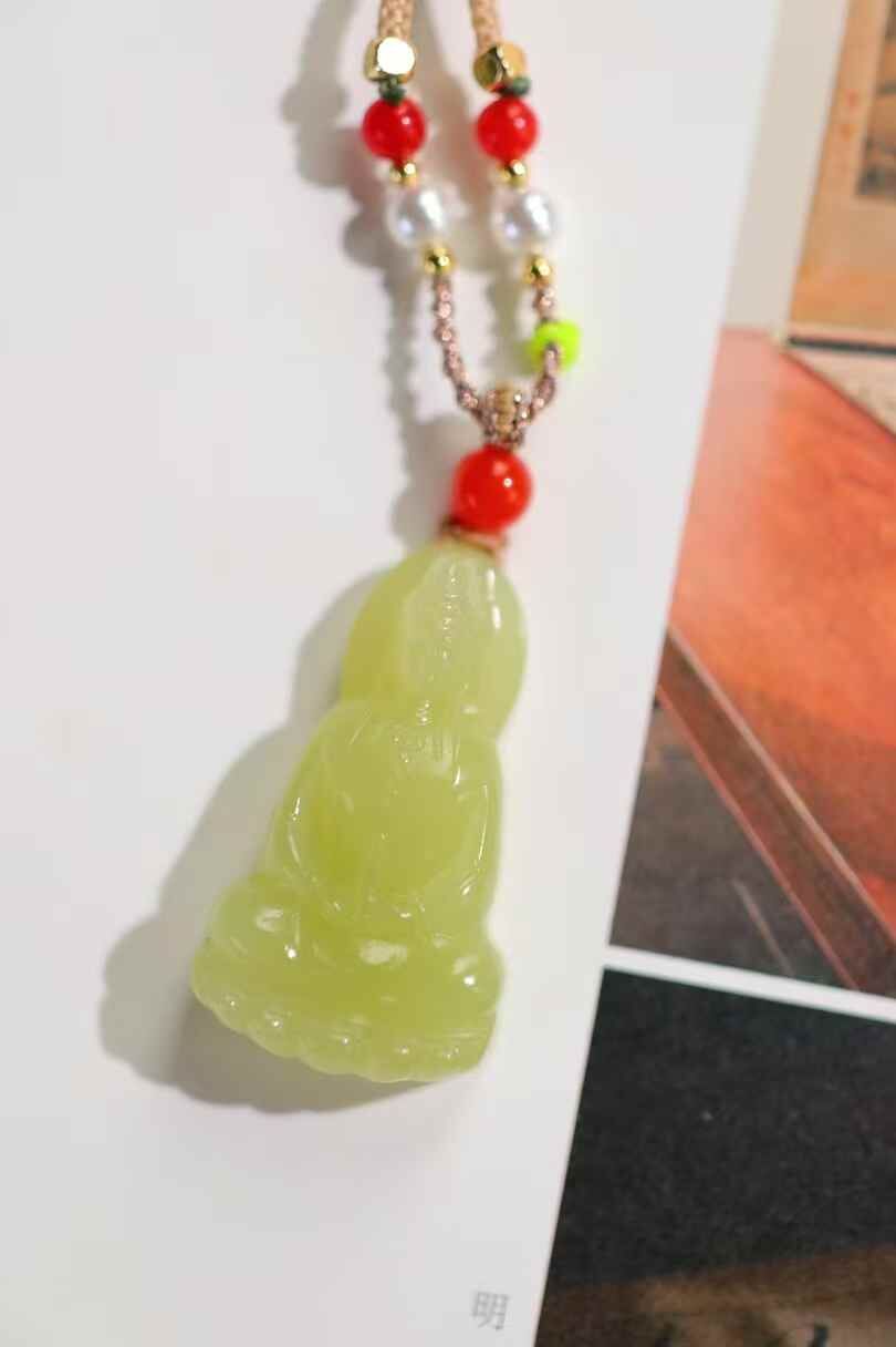 36735 和田玉若羌黃口料觀音