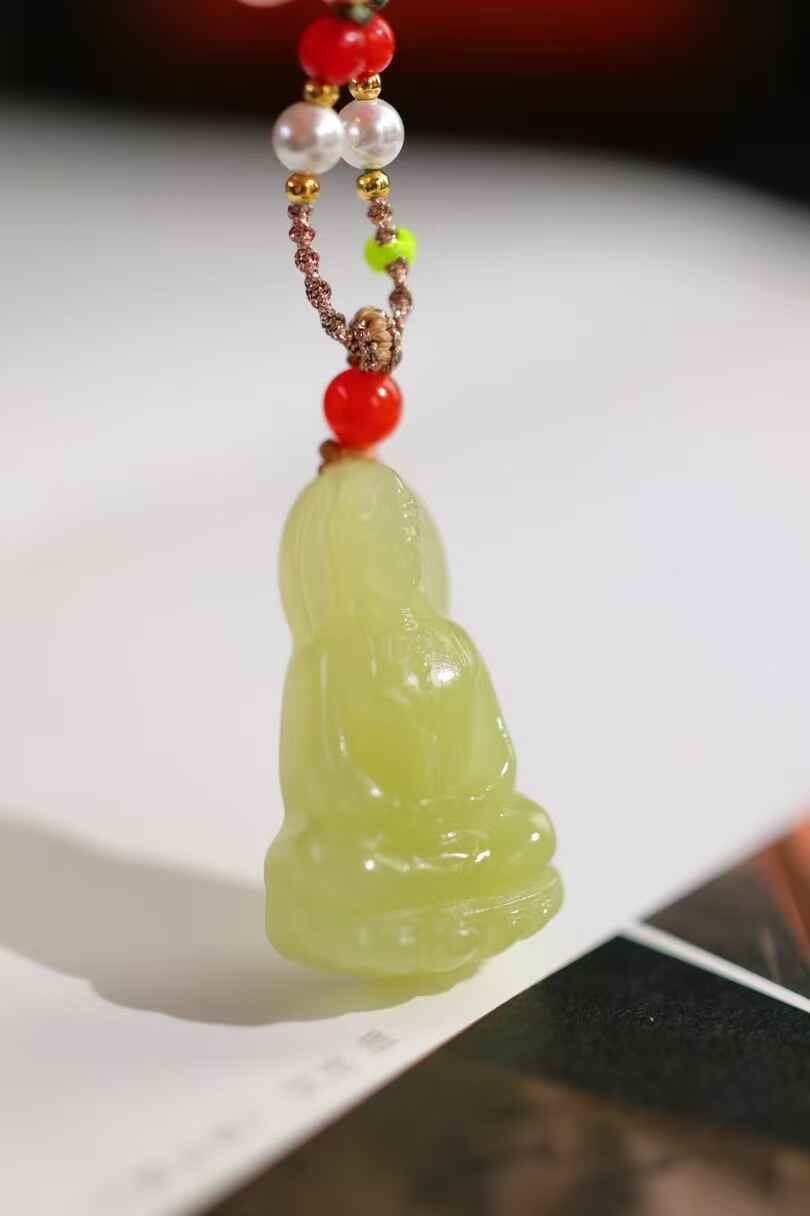 36735 和田玉若羌黃口料觀音