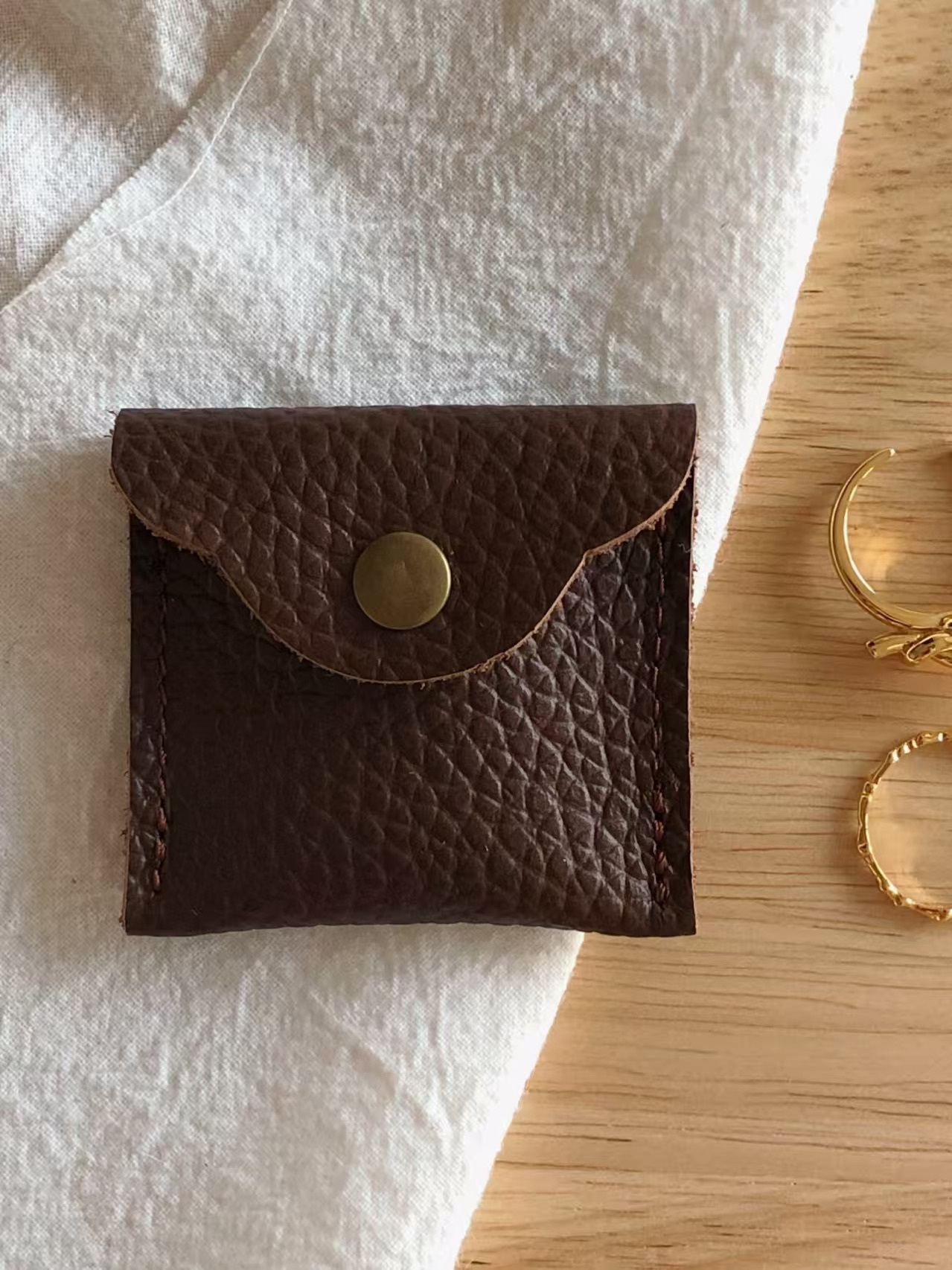 Mini leather jewelry pouch