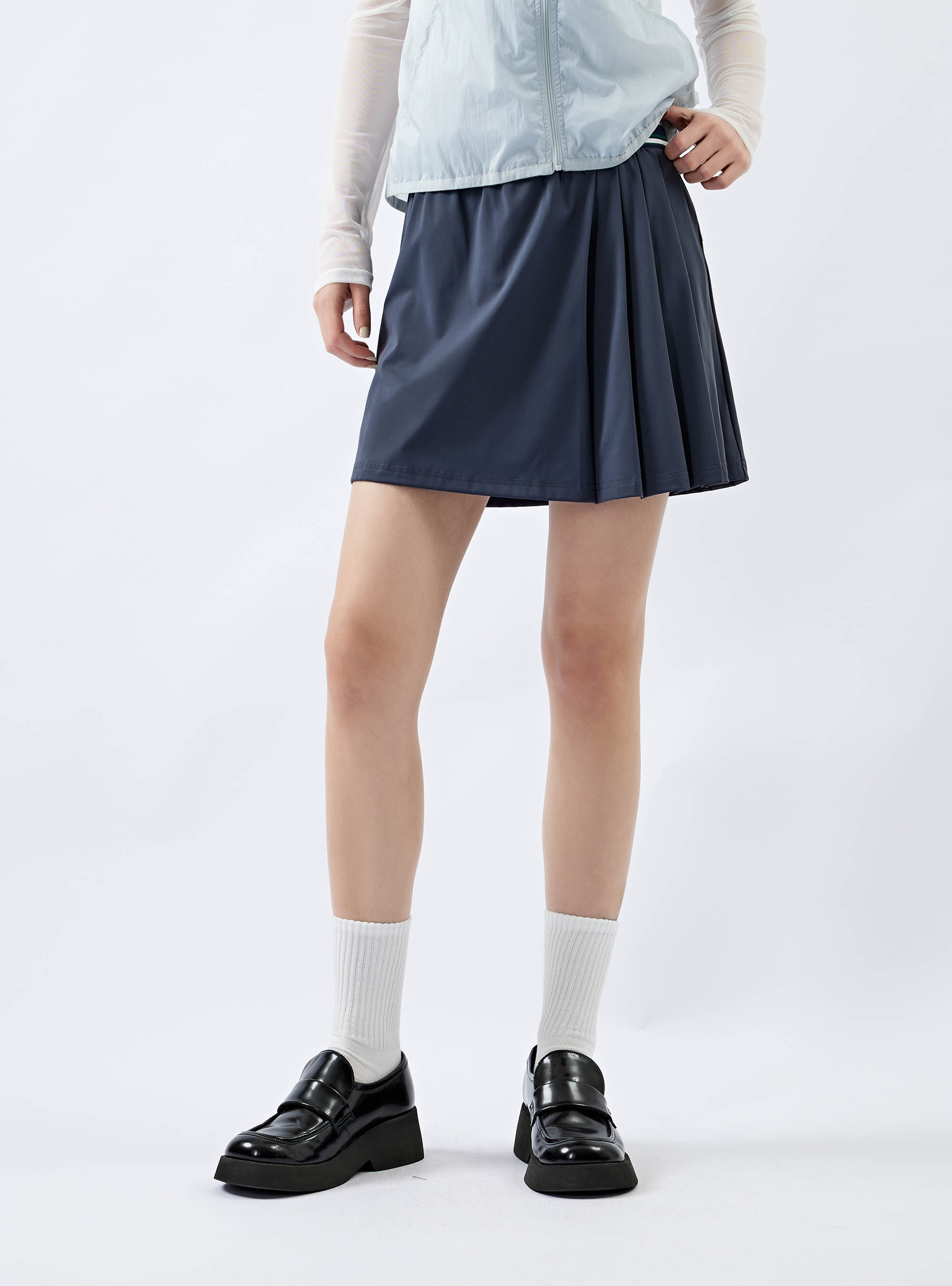 女款 鬆緊腰頭不對稱百褶短裙