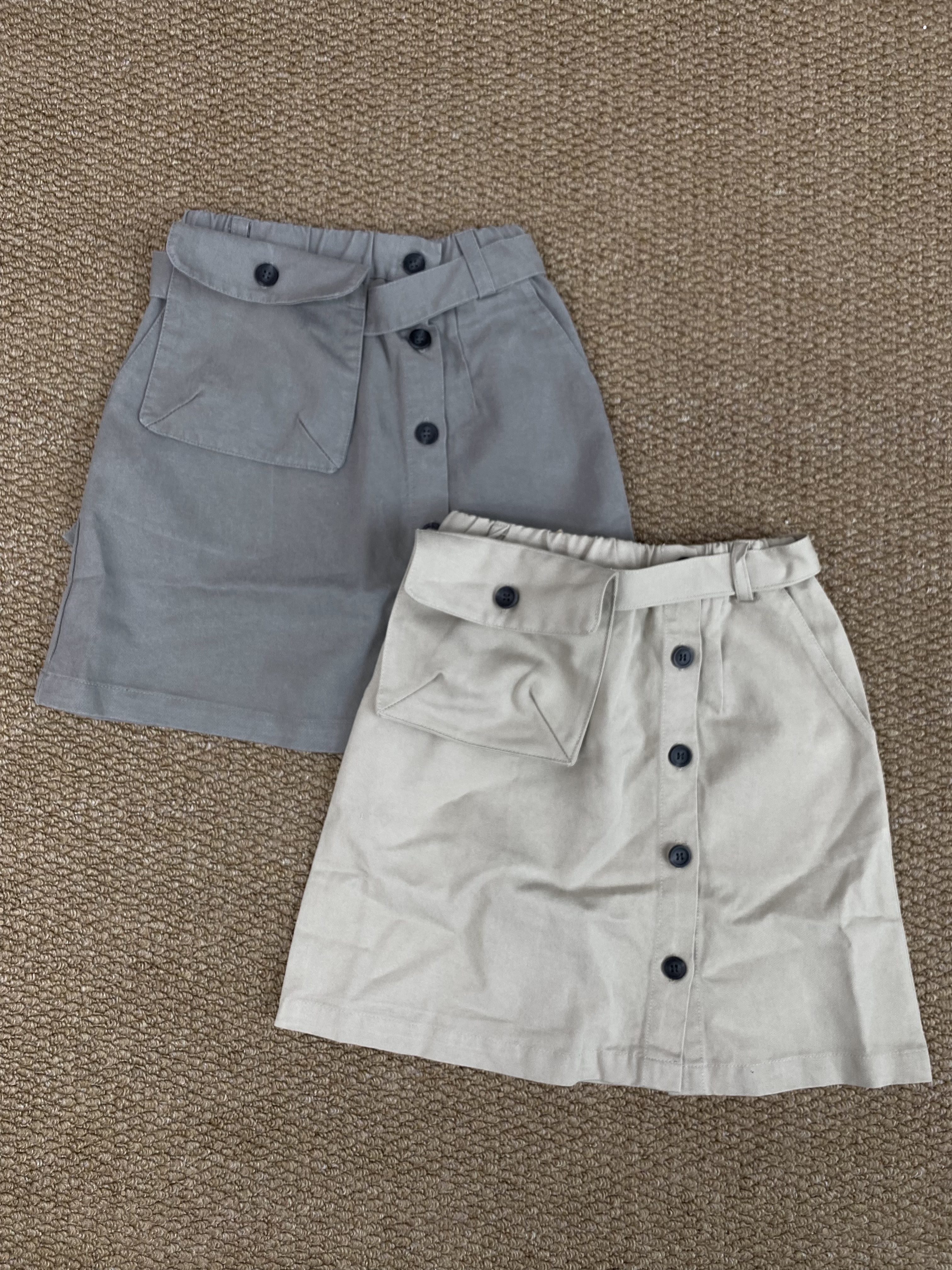 A04554腰包排釦半身裙