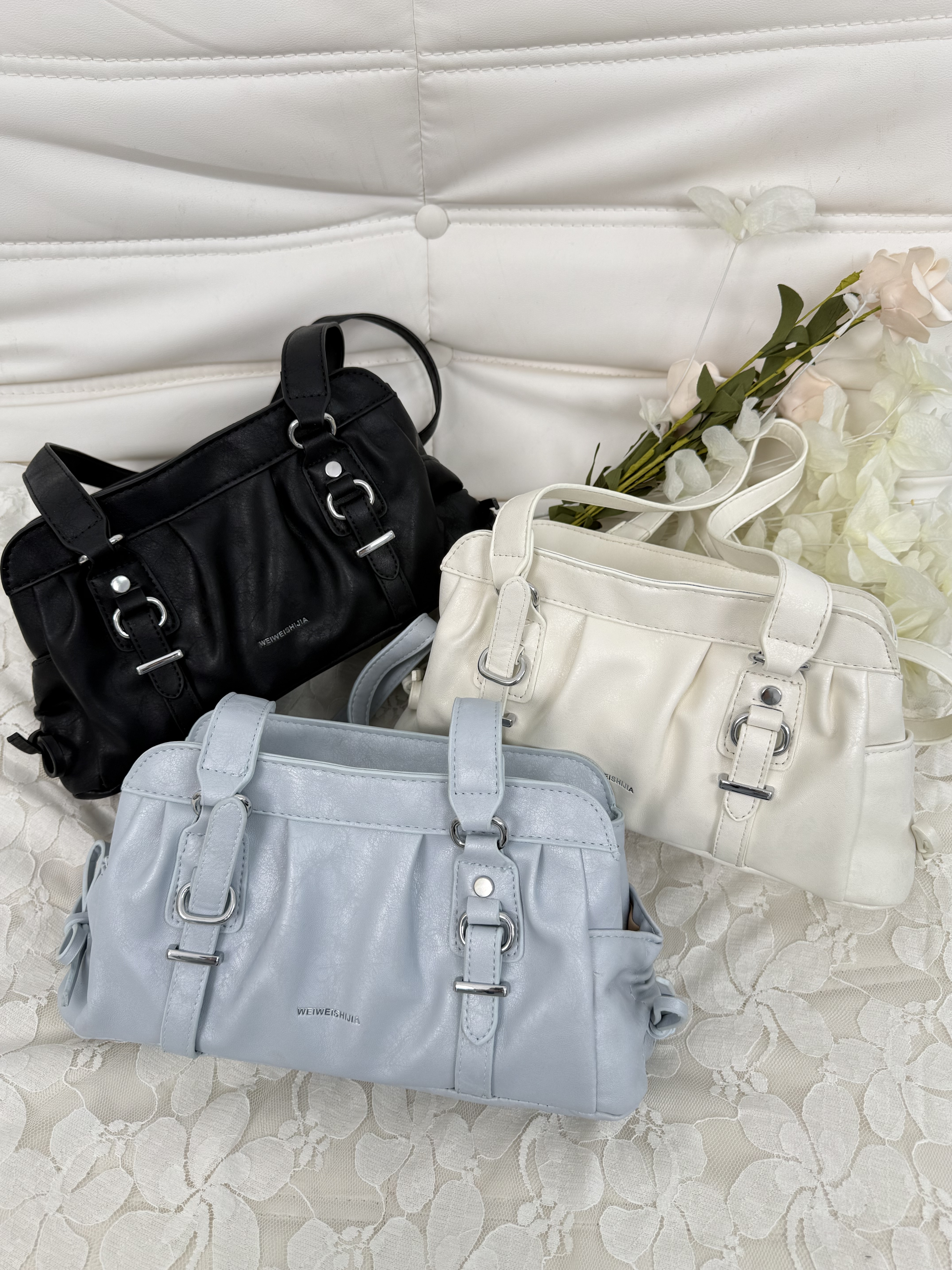 B44皮革設計感縮繩包包