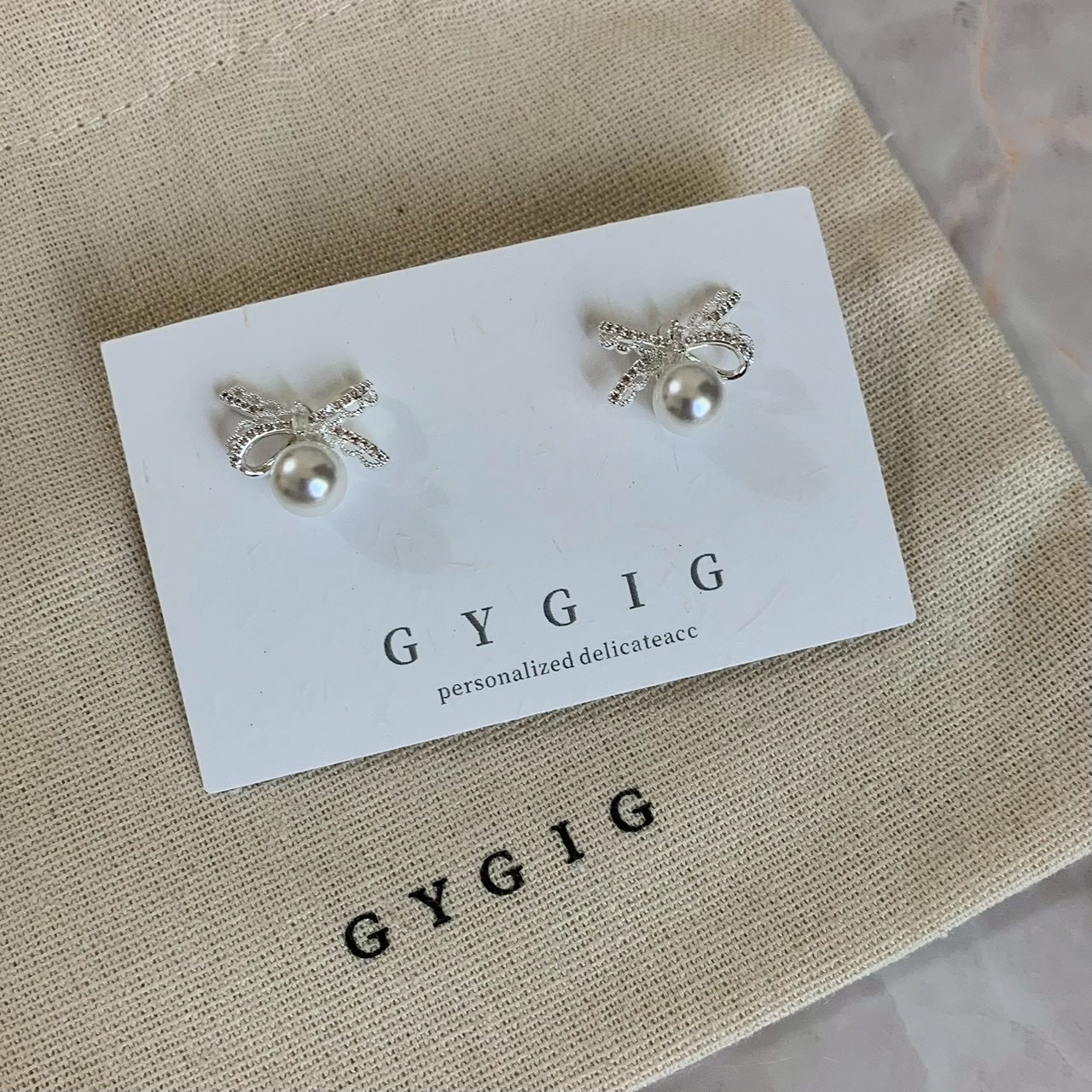 Gy”Solace白金鑽蕾絲蝴蝶結鑽耳釘/現貨1