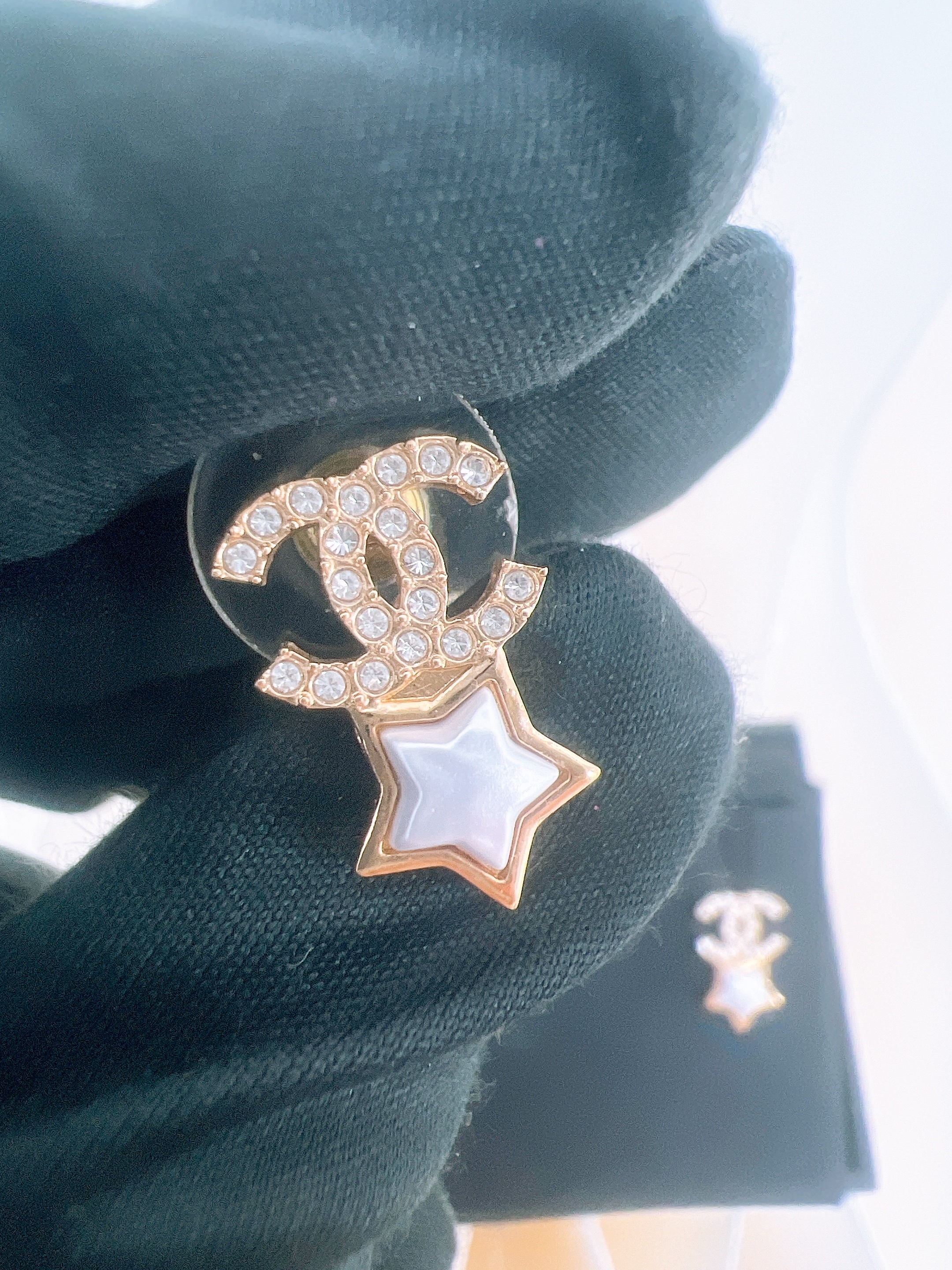 Chanel 24c star earrings white